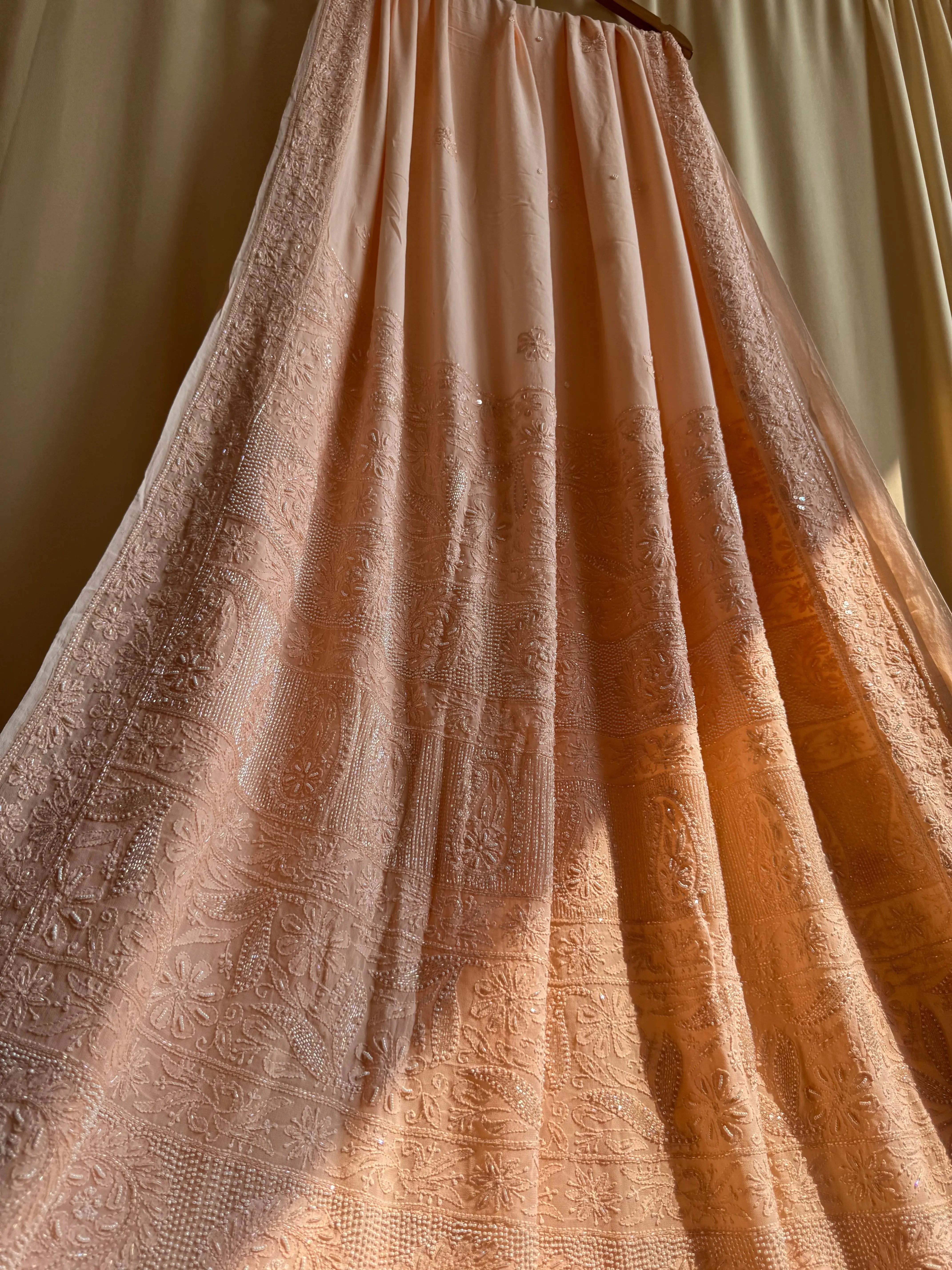 Viscose Peach Chikankari saree with Pearl embellishments ARIAA CHIKANKARI