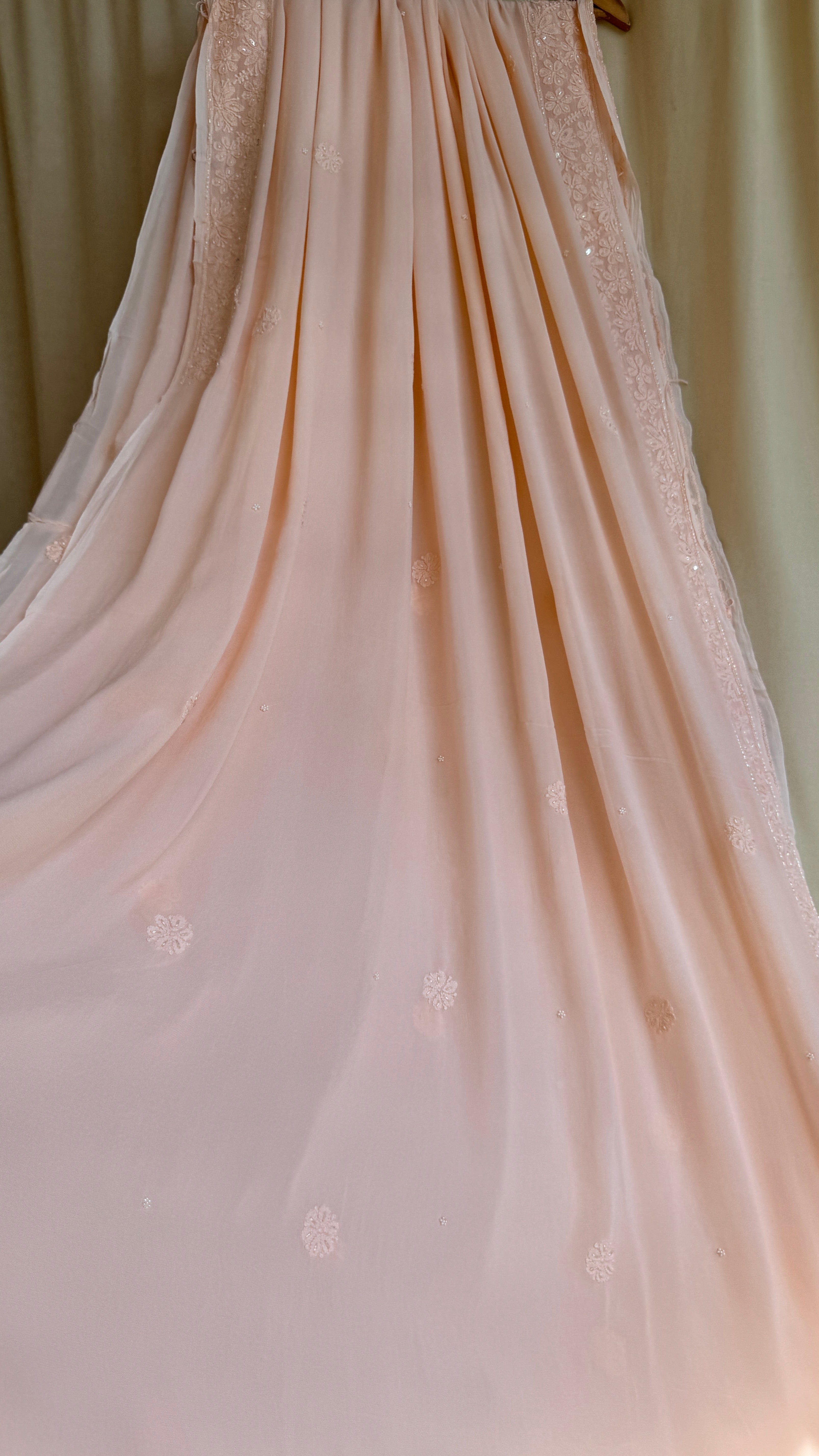 Viscose Peach Chikankari saree with Pearl embellishments