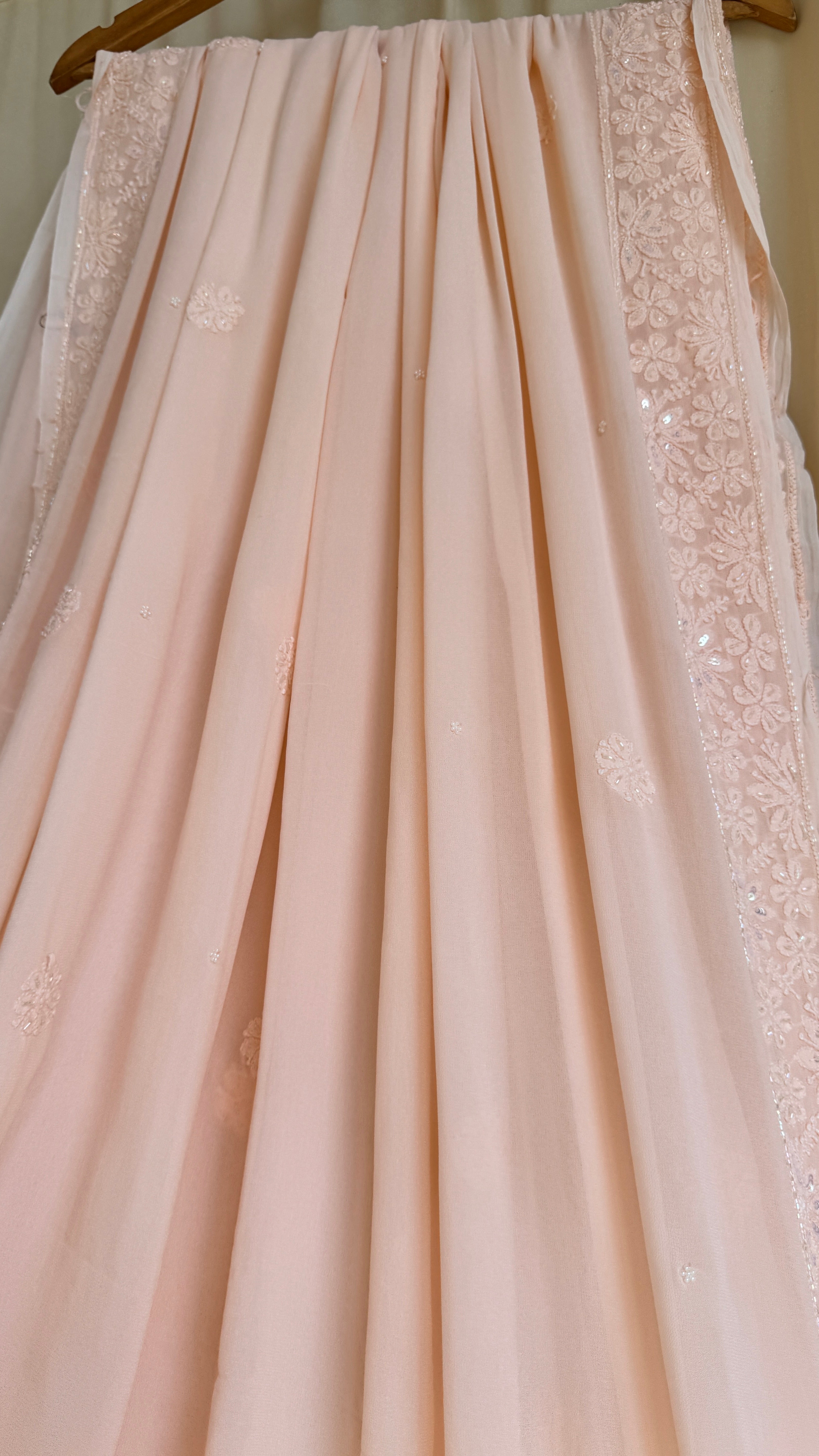 Viscose Peach Chikankari saree with Pearl embellishments