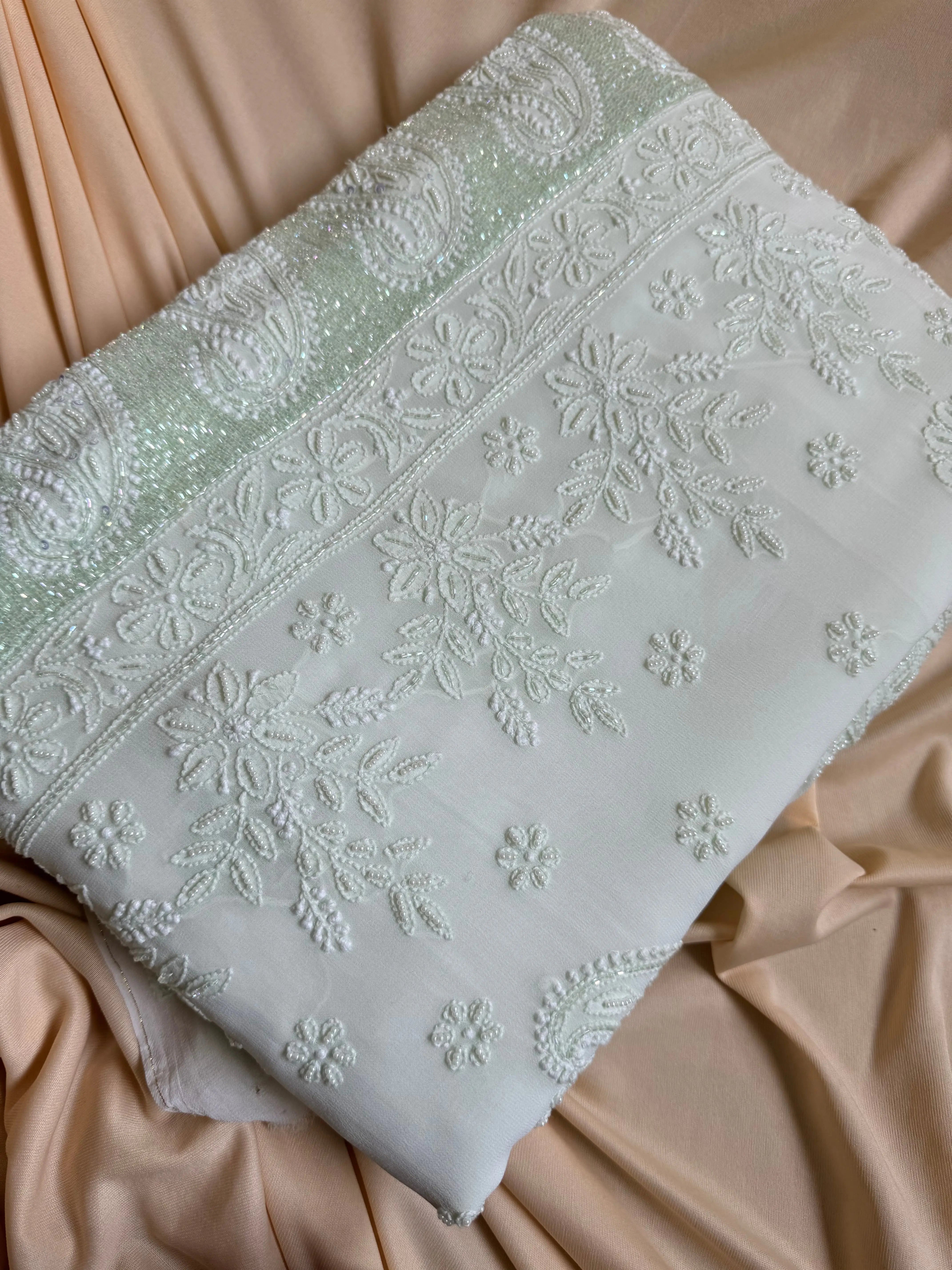 Green Chikankari saree with Pearl embellishments ARIAA CHIKANKARI 