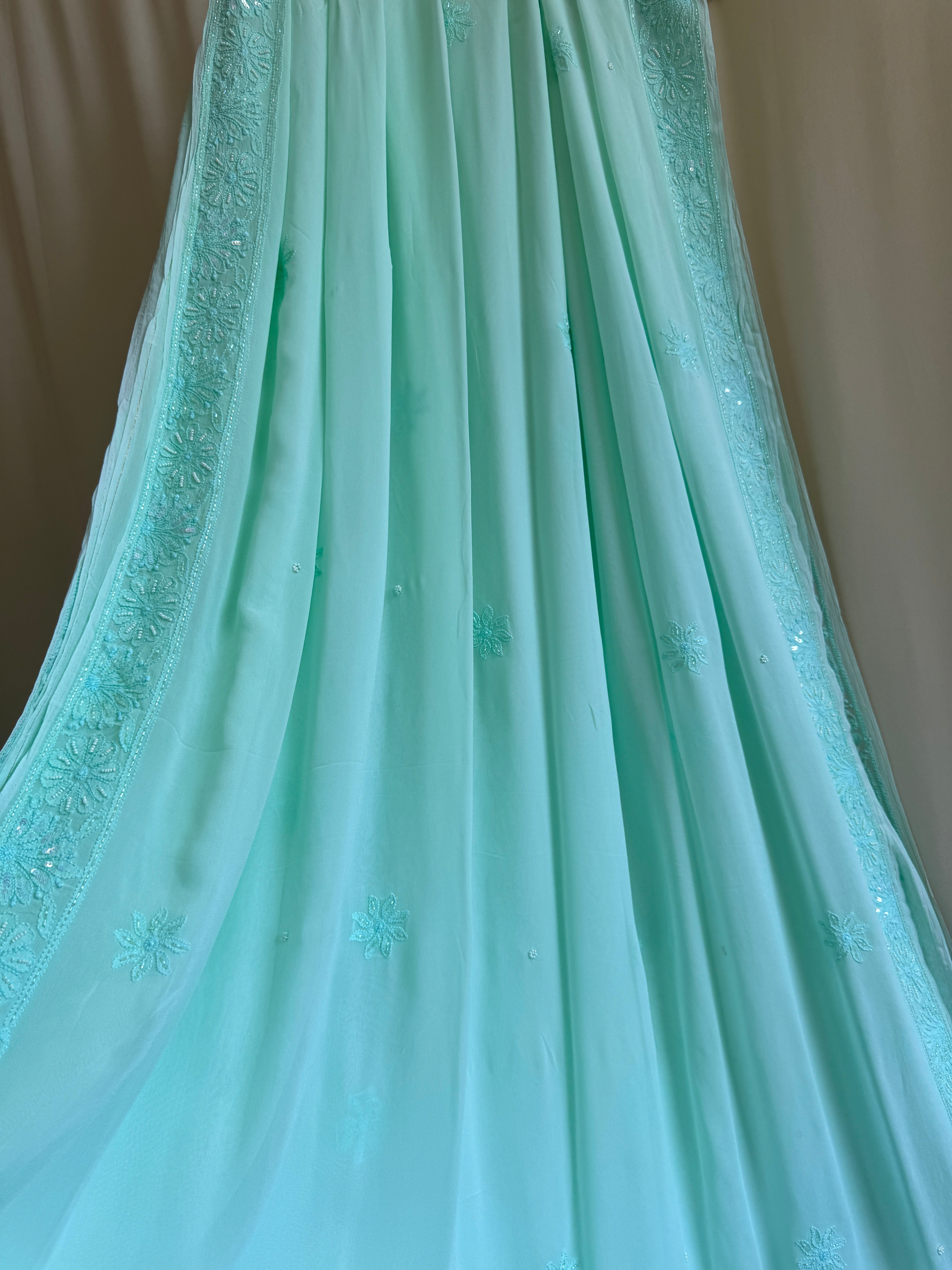 Green Chikankari saree with Pearl embellishments