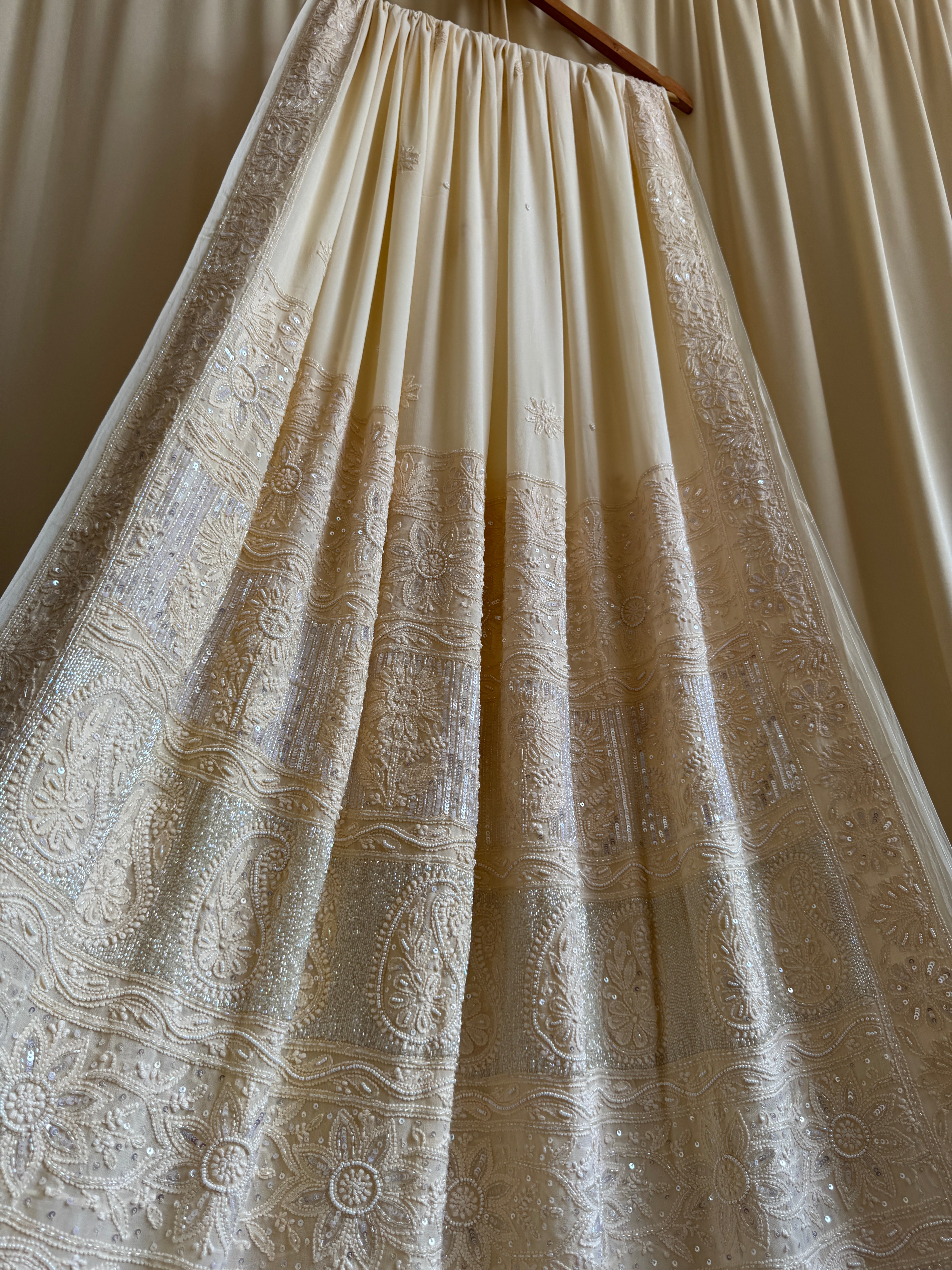 Viscose Cream Chikankari saree with Pearl embellishments