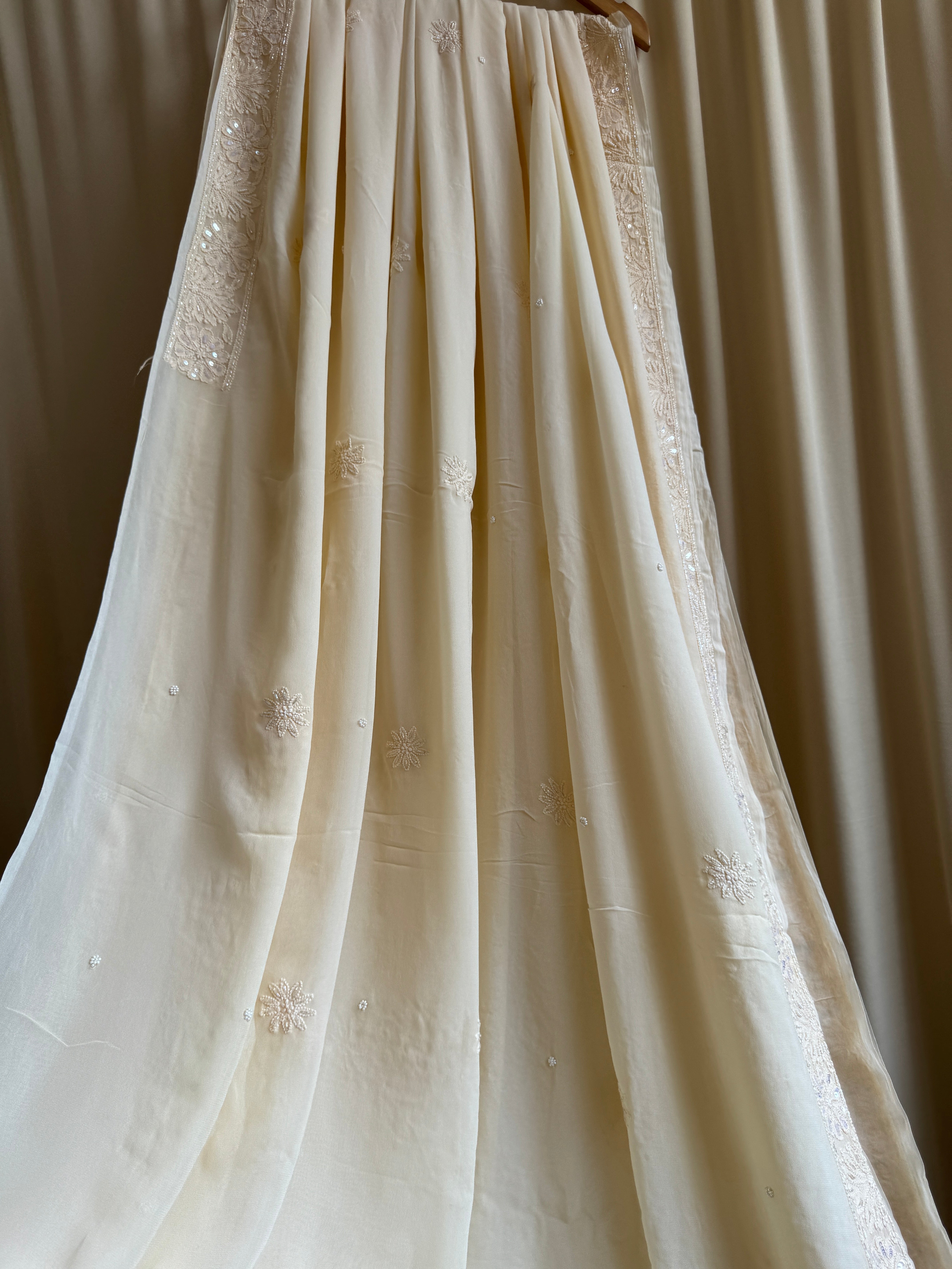 Viscose Cream Chikankari saree with Pearl embellishments