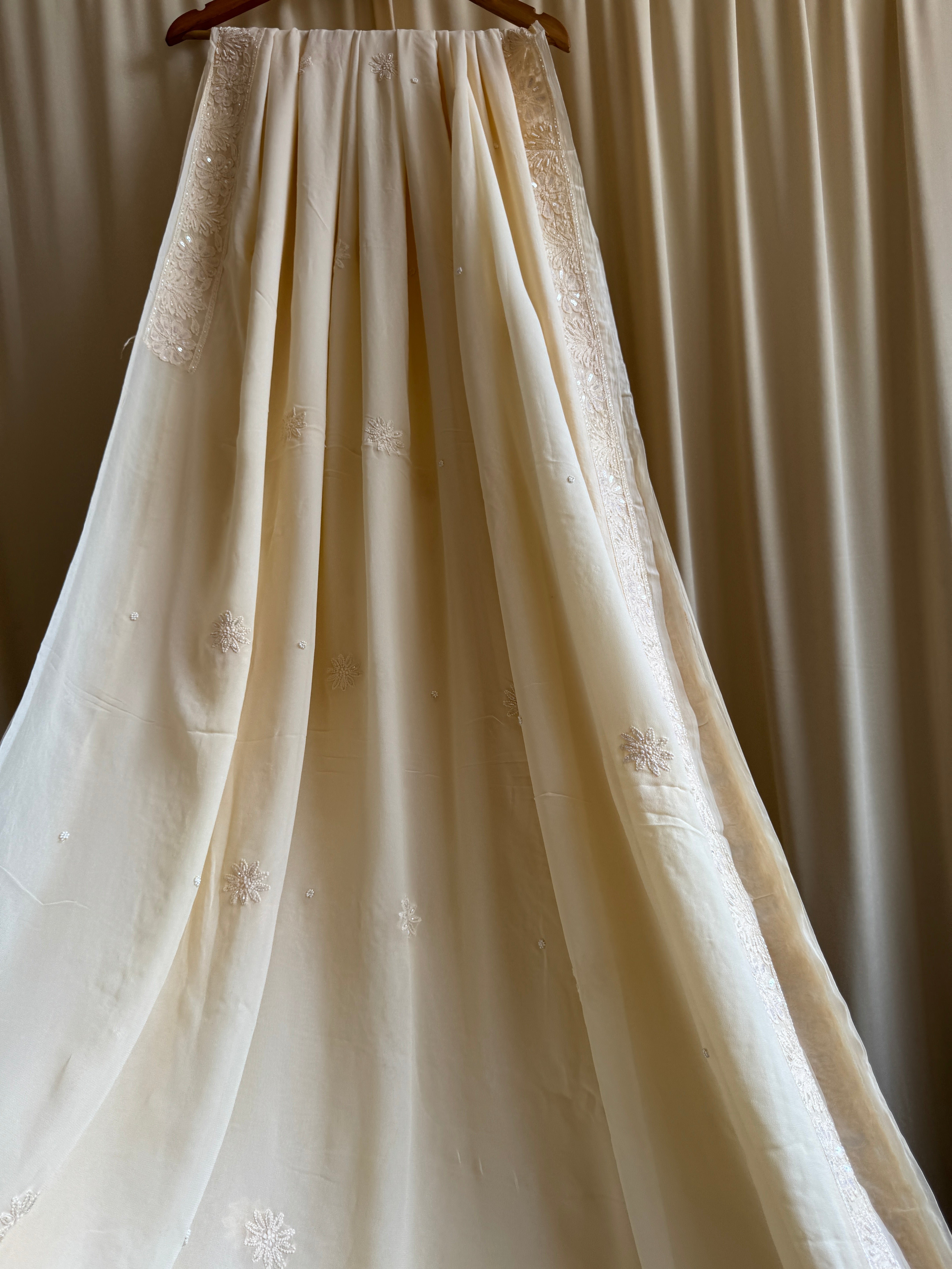 Viscose Cream Chikankari saree with Pearl embellishments