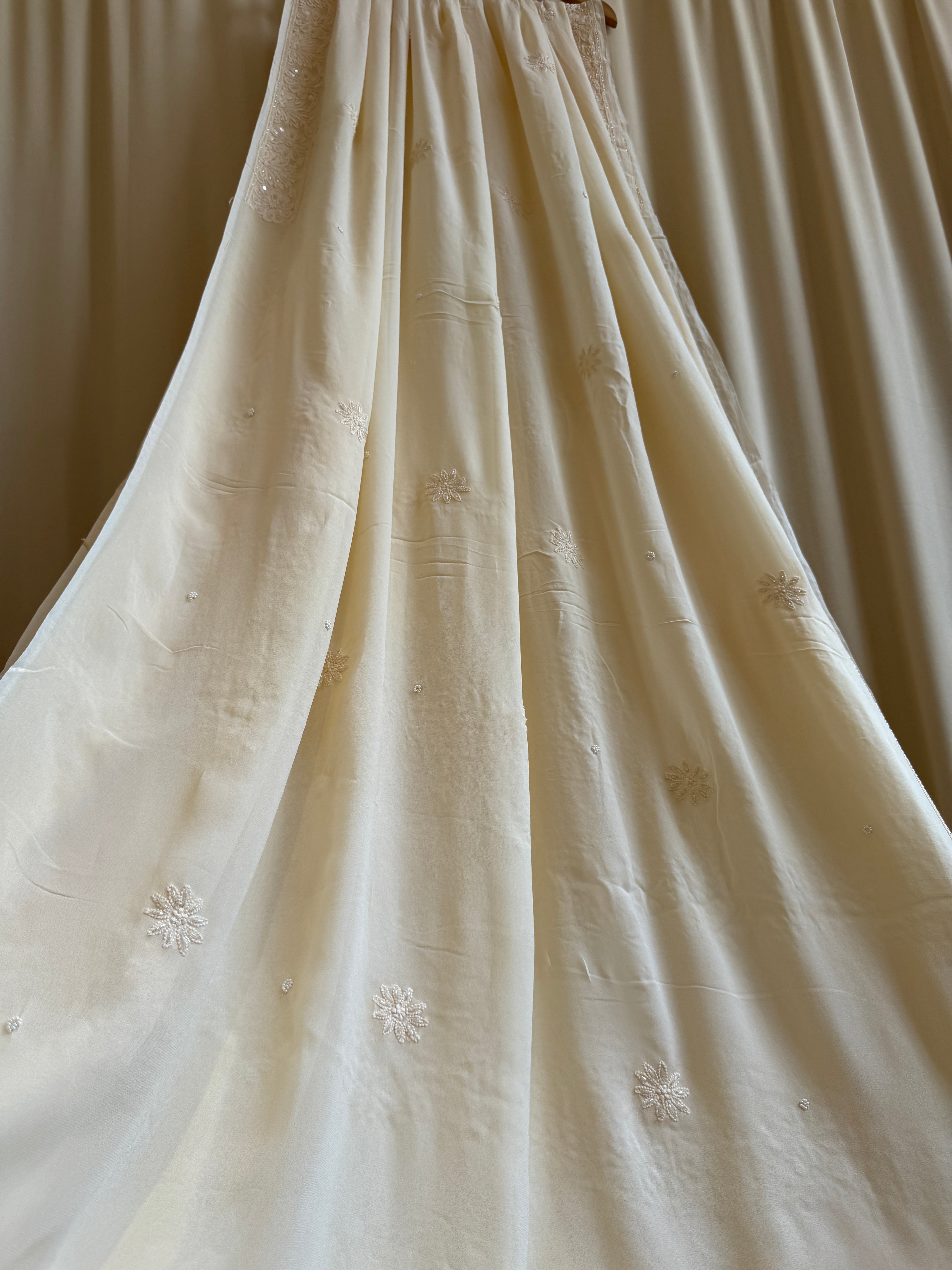 Viscose Cream Chikankari saree with Pearl embellishments