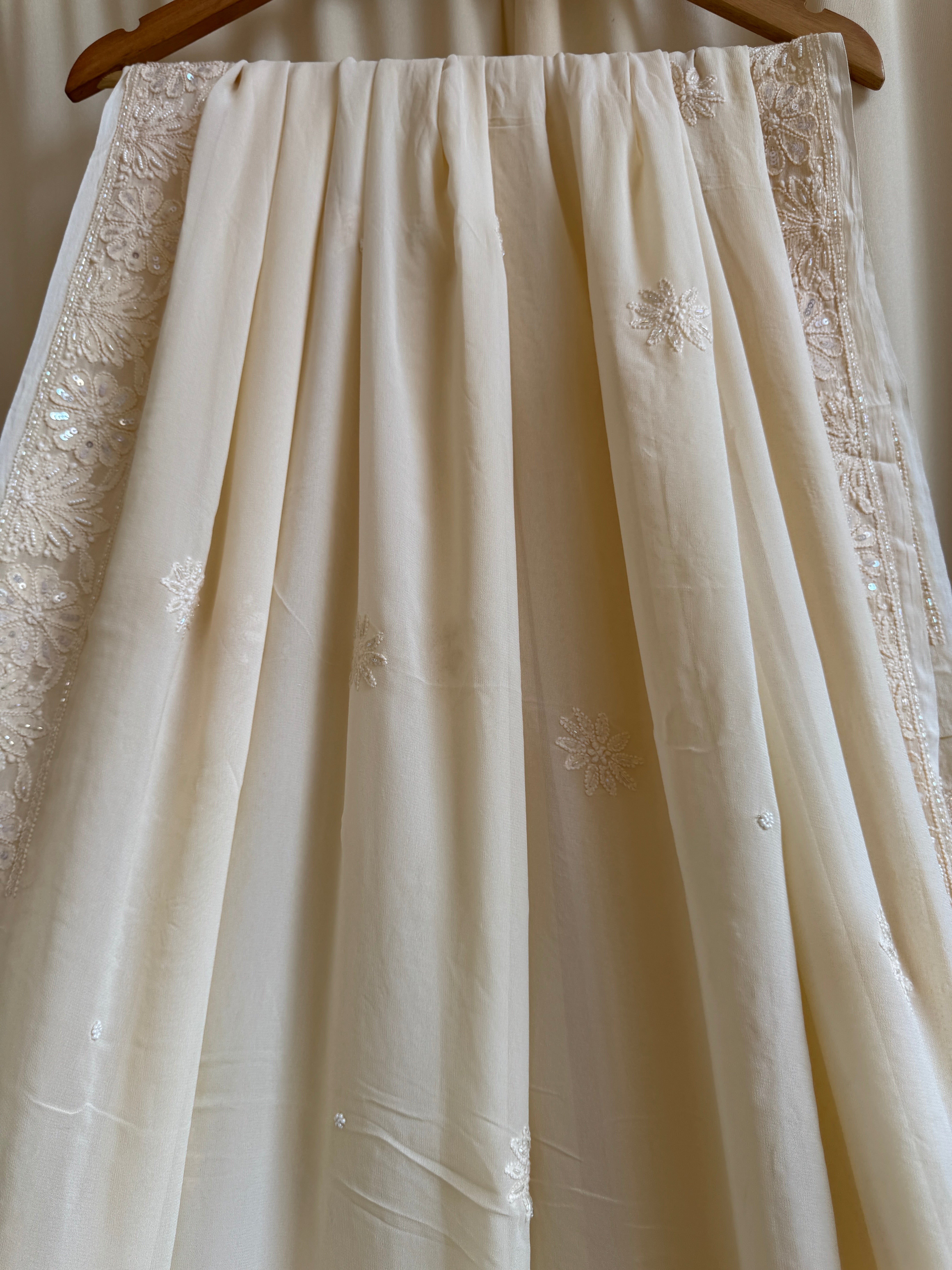 Viscose Cream Chikankari saree with Pearl embellishments