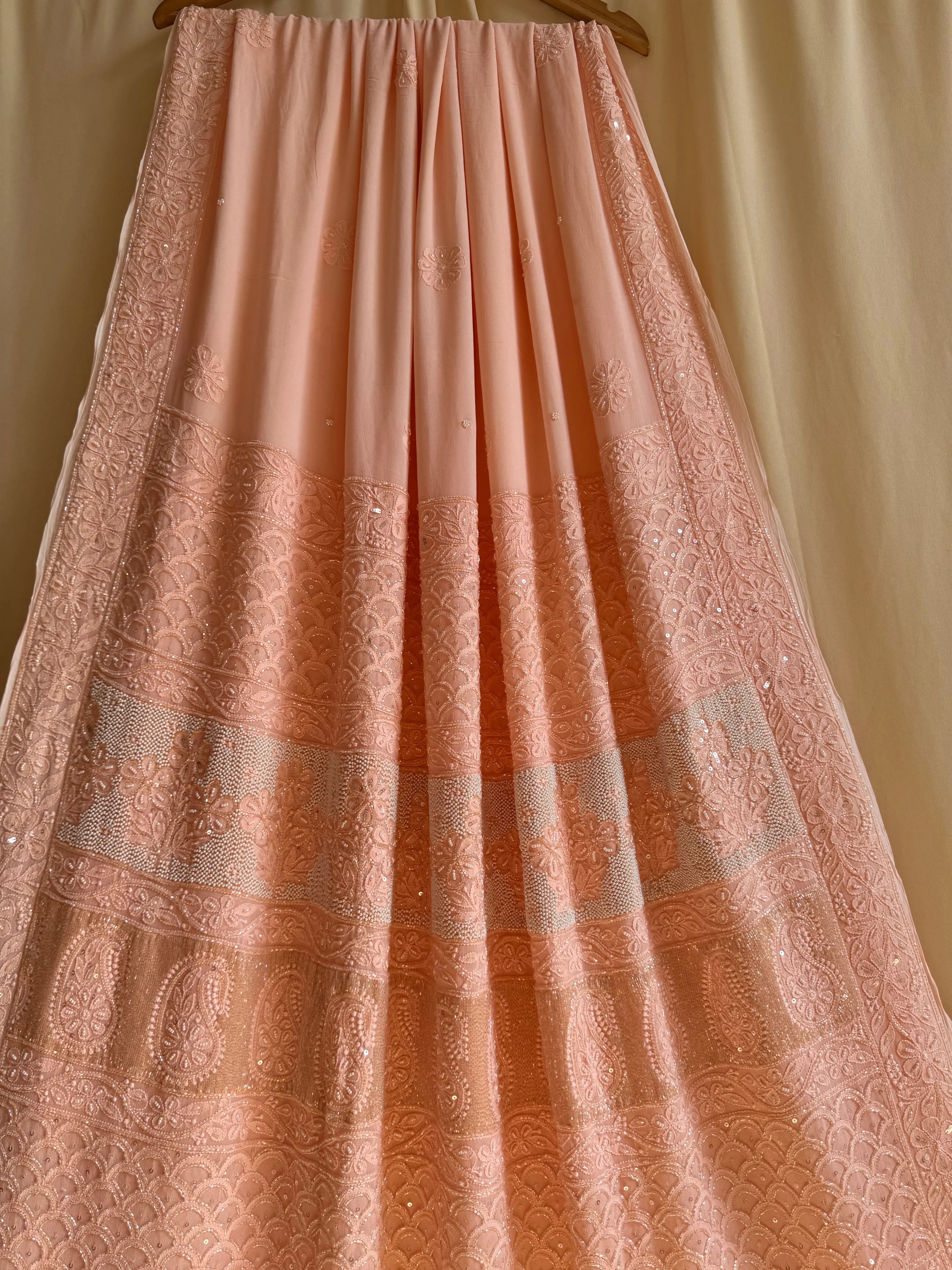 Viscose Peach Chikankari saree with Pearl embellishments ARIAA CHIKANKARI 