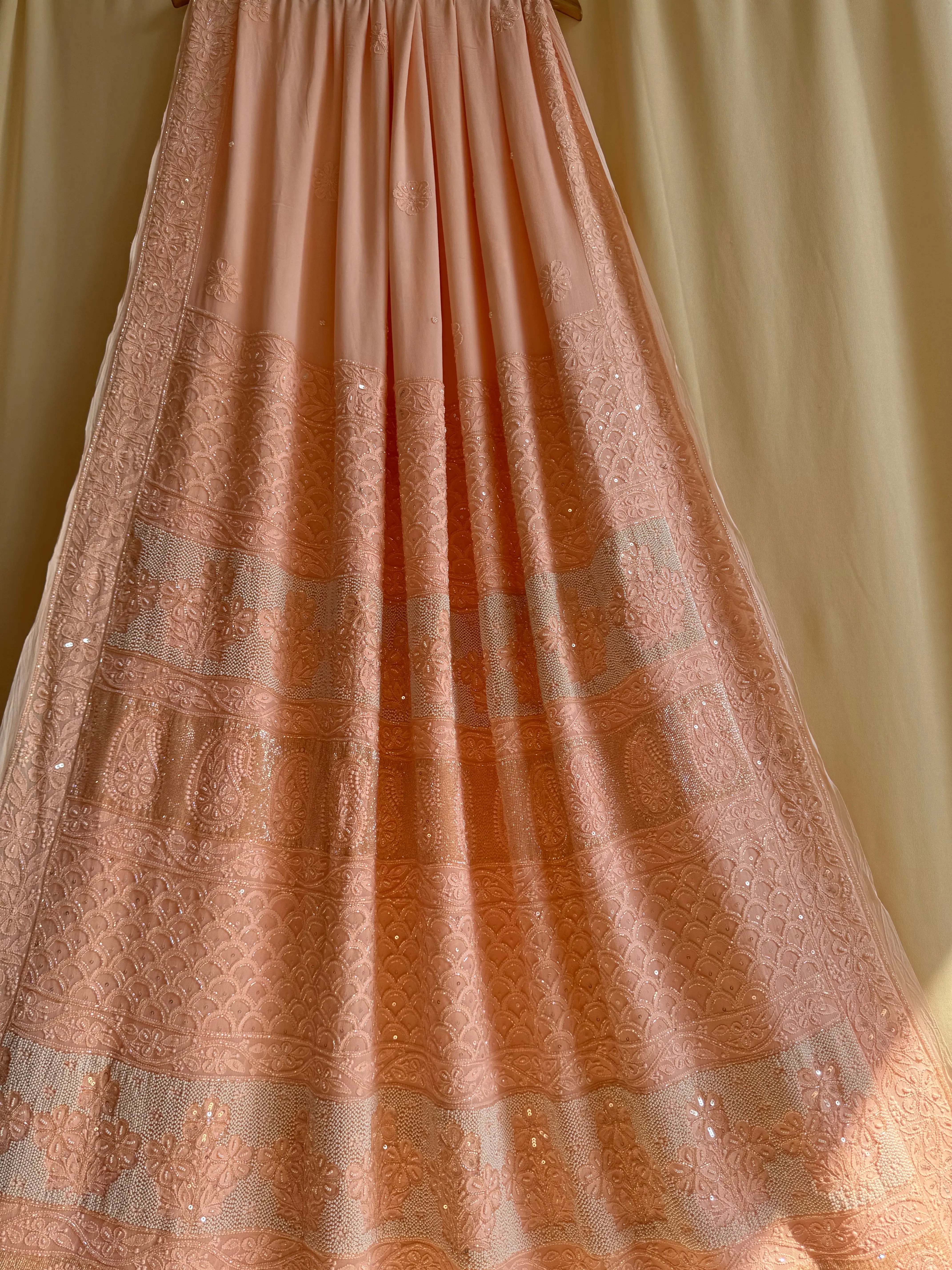 Viscose Peach Chikankari saree with Pearl embellishments ARIAA CHIKANKARI 