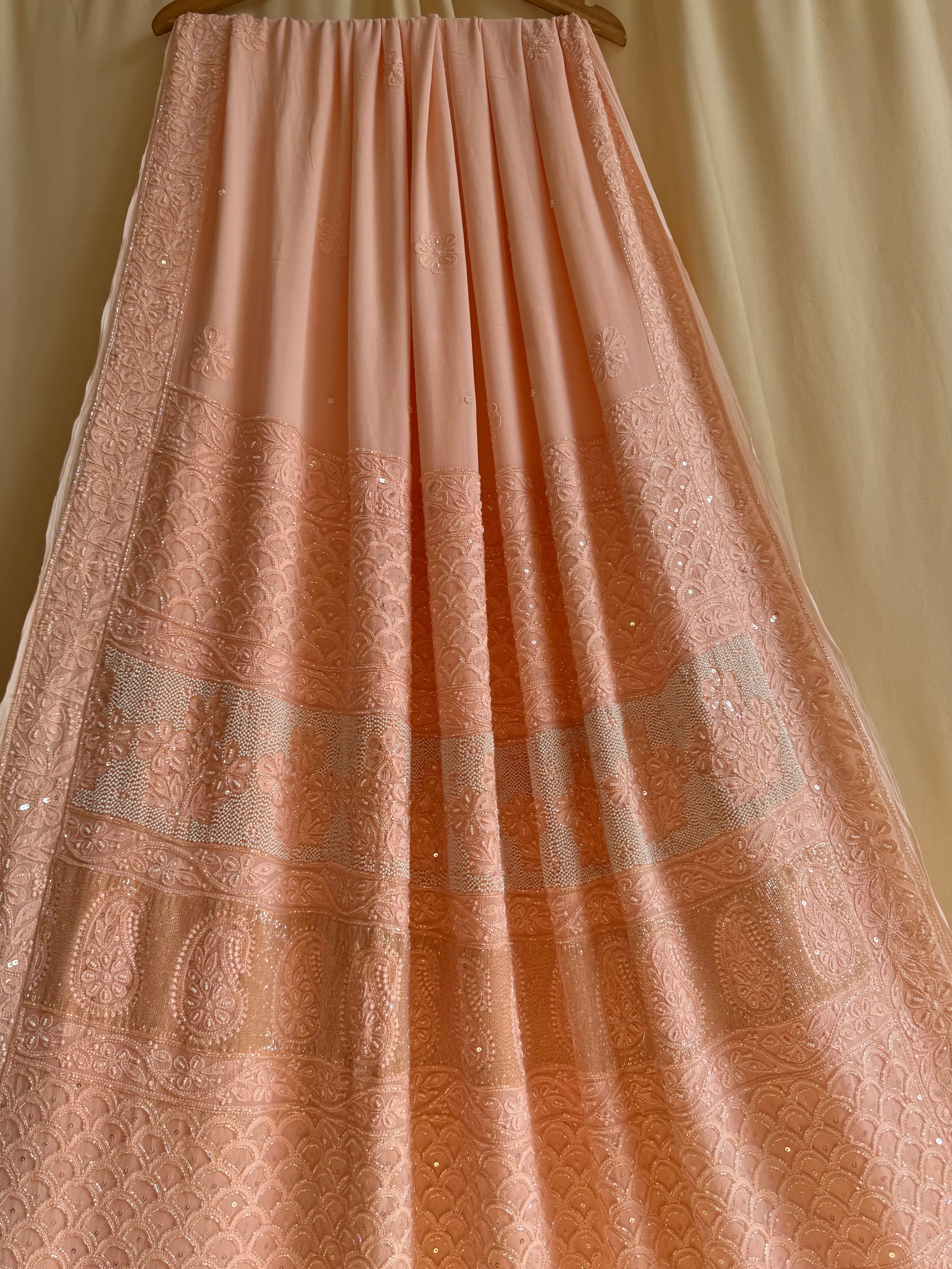 Viscose Peach Chikankari saree with Pearl embellishments ARIAA CHIKANKARI 