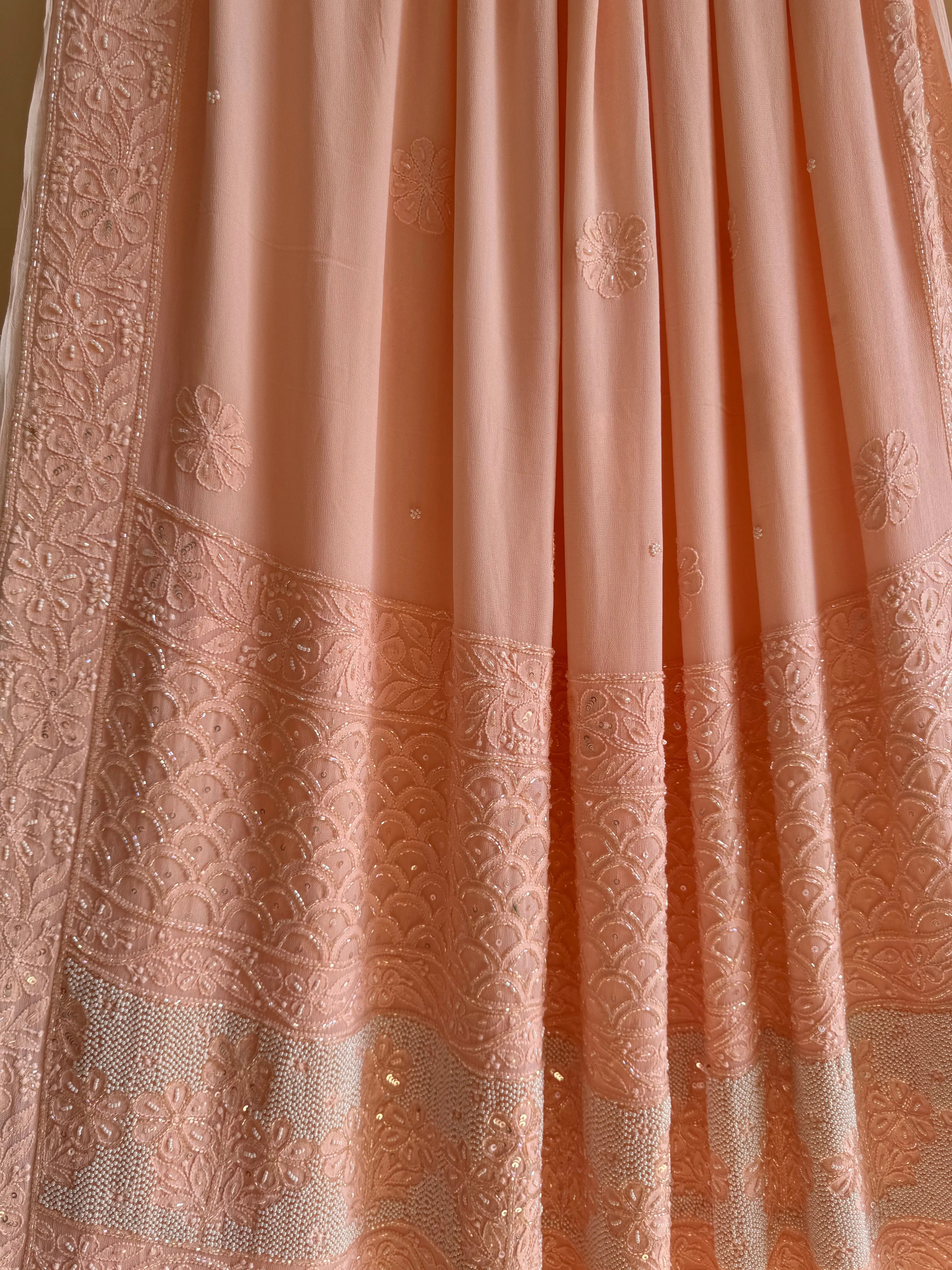 Viscose Peach Chikankari saree with Pearl embellishments ARIAA CHIKANKARI 