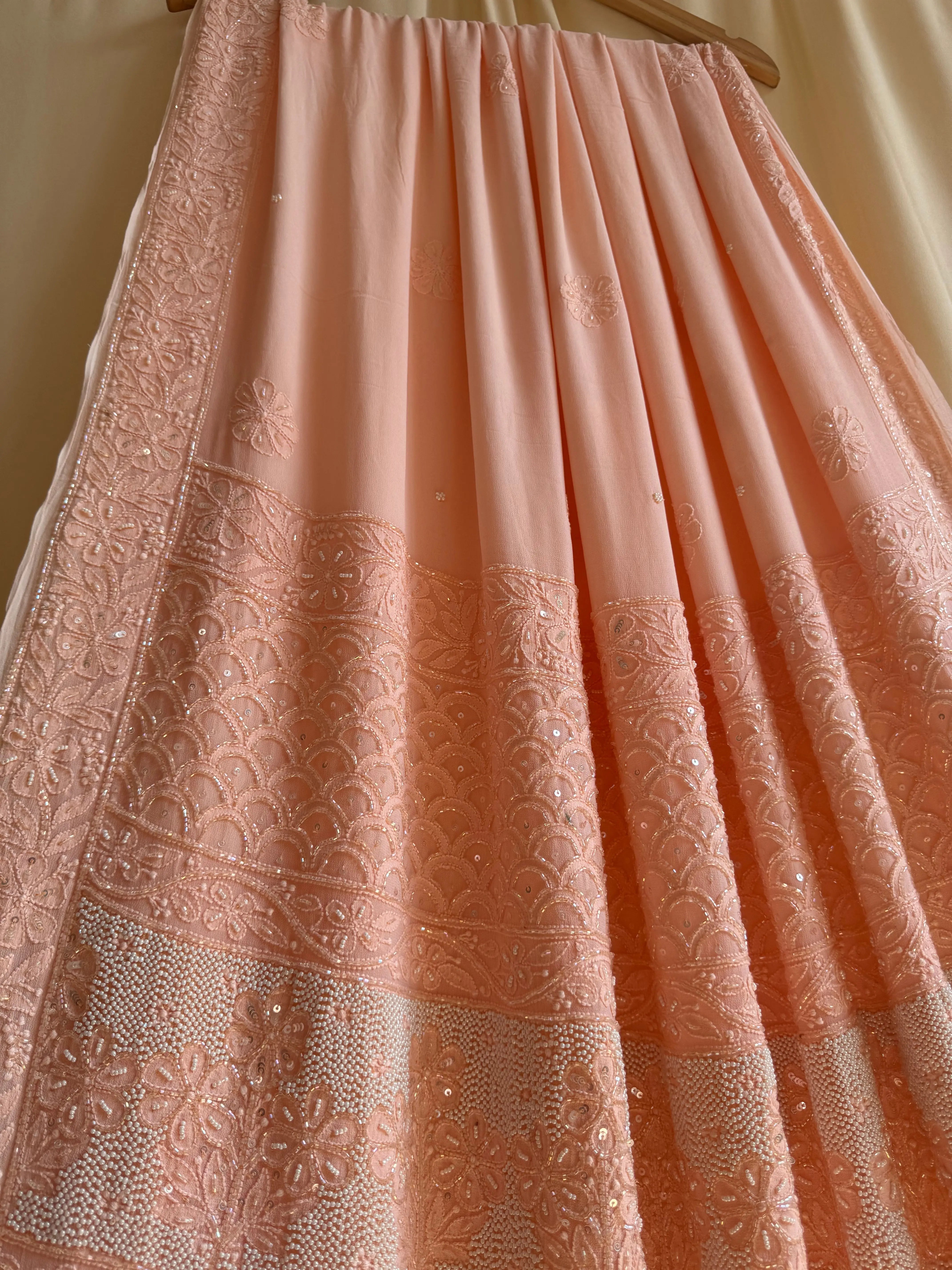 Viscose Peach Chikankari saree with Pearl embellishments ARIAA CHIKANKARI 