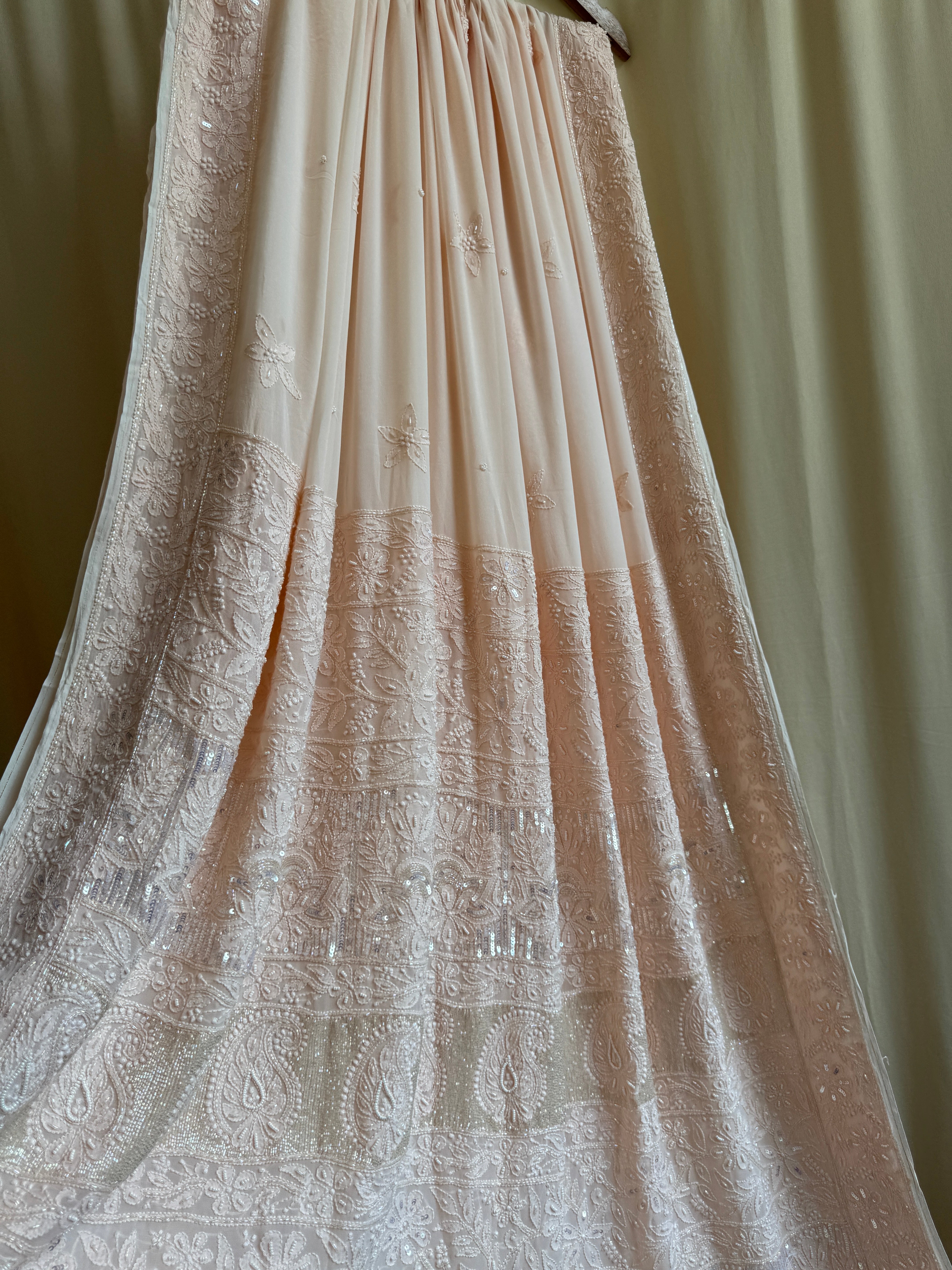 Viscose Peach Chikankari saree with Pearl embellishments