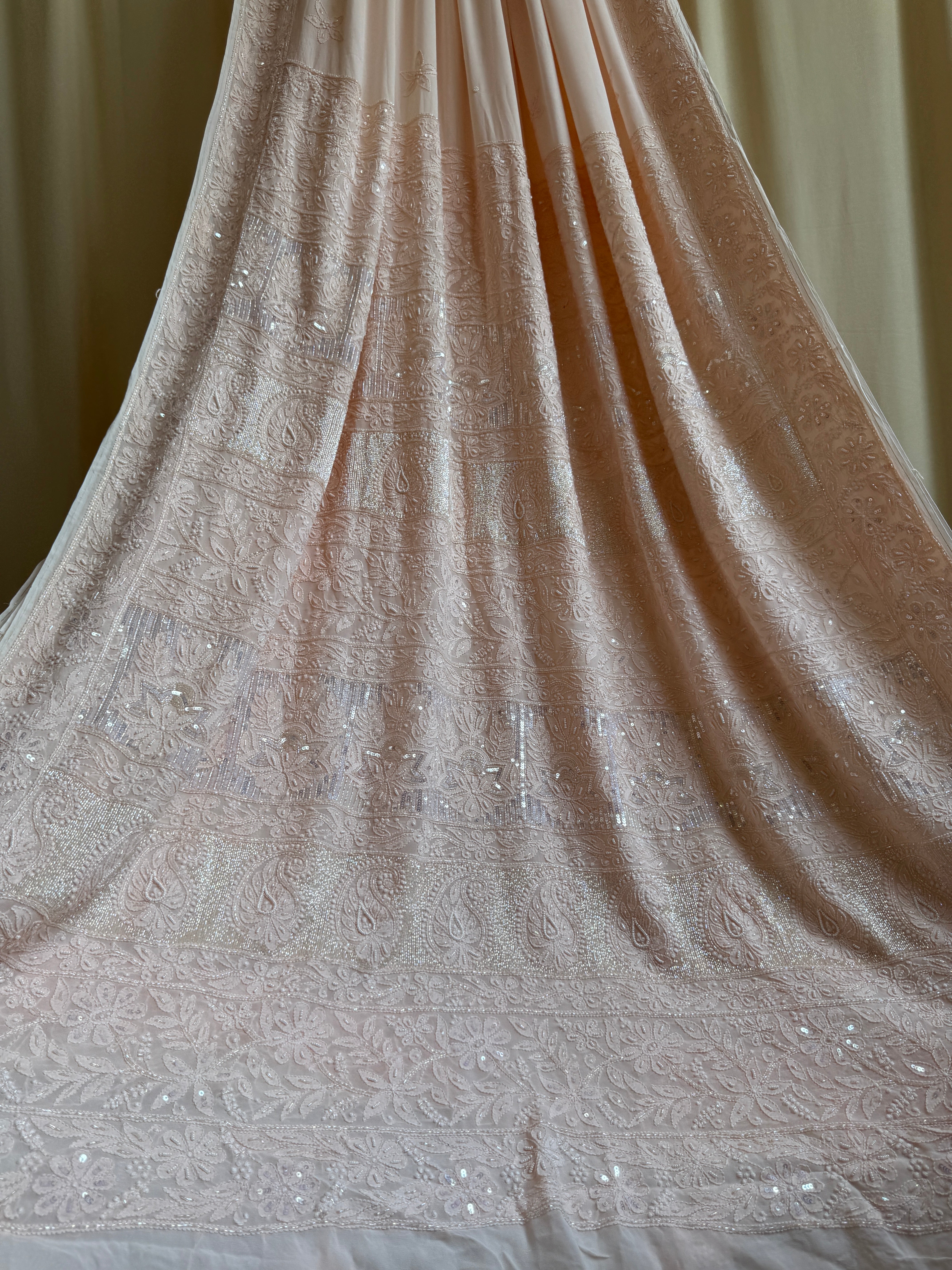 Viscose Peach Chikankari saree with Pearl embellishments