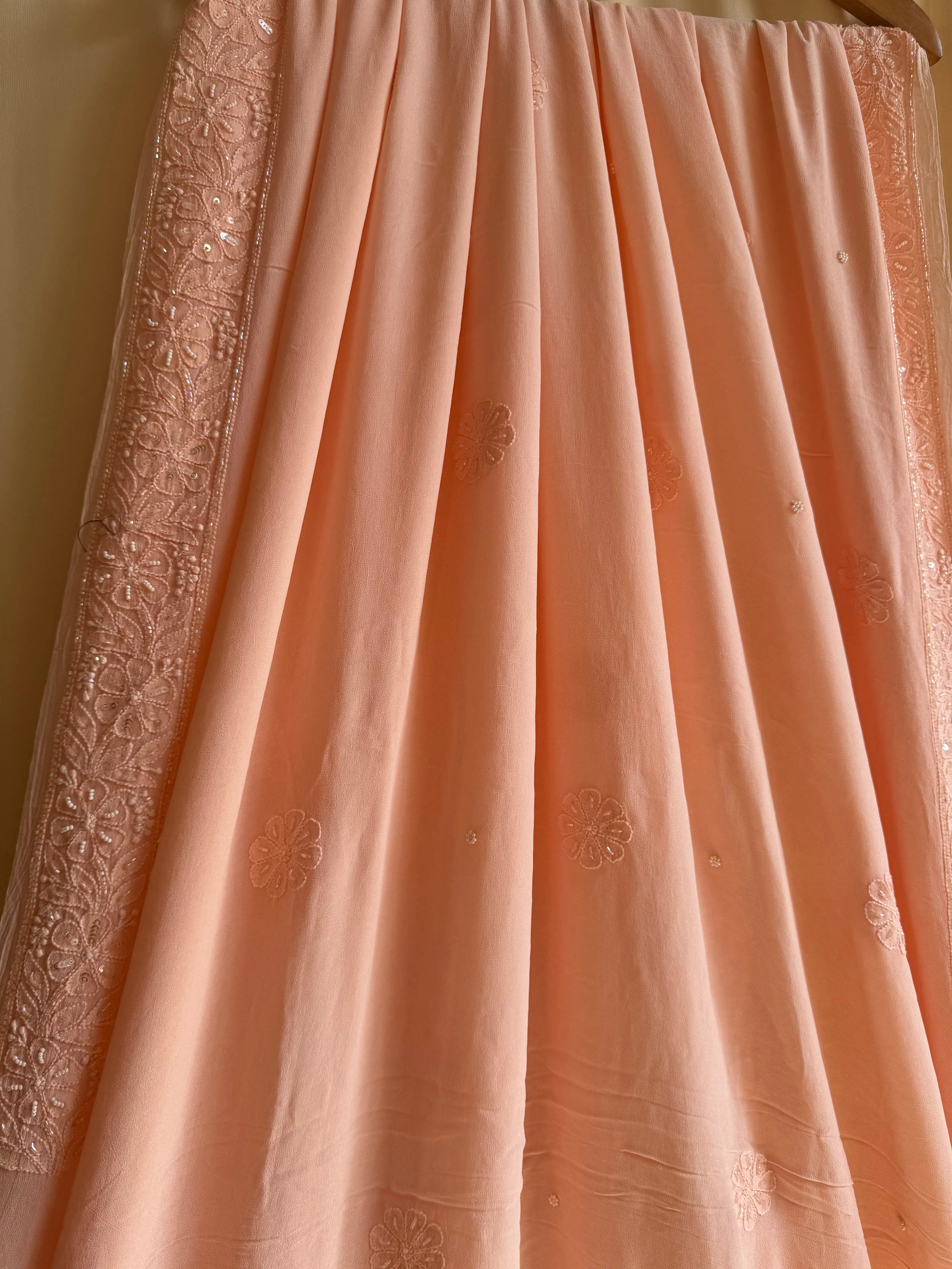 Viscose Peach Chikankari saree with Pearl embellishments ARIAA CHIKANKARI 