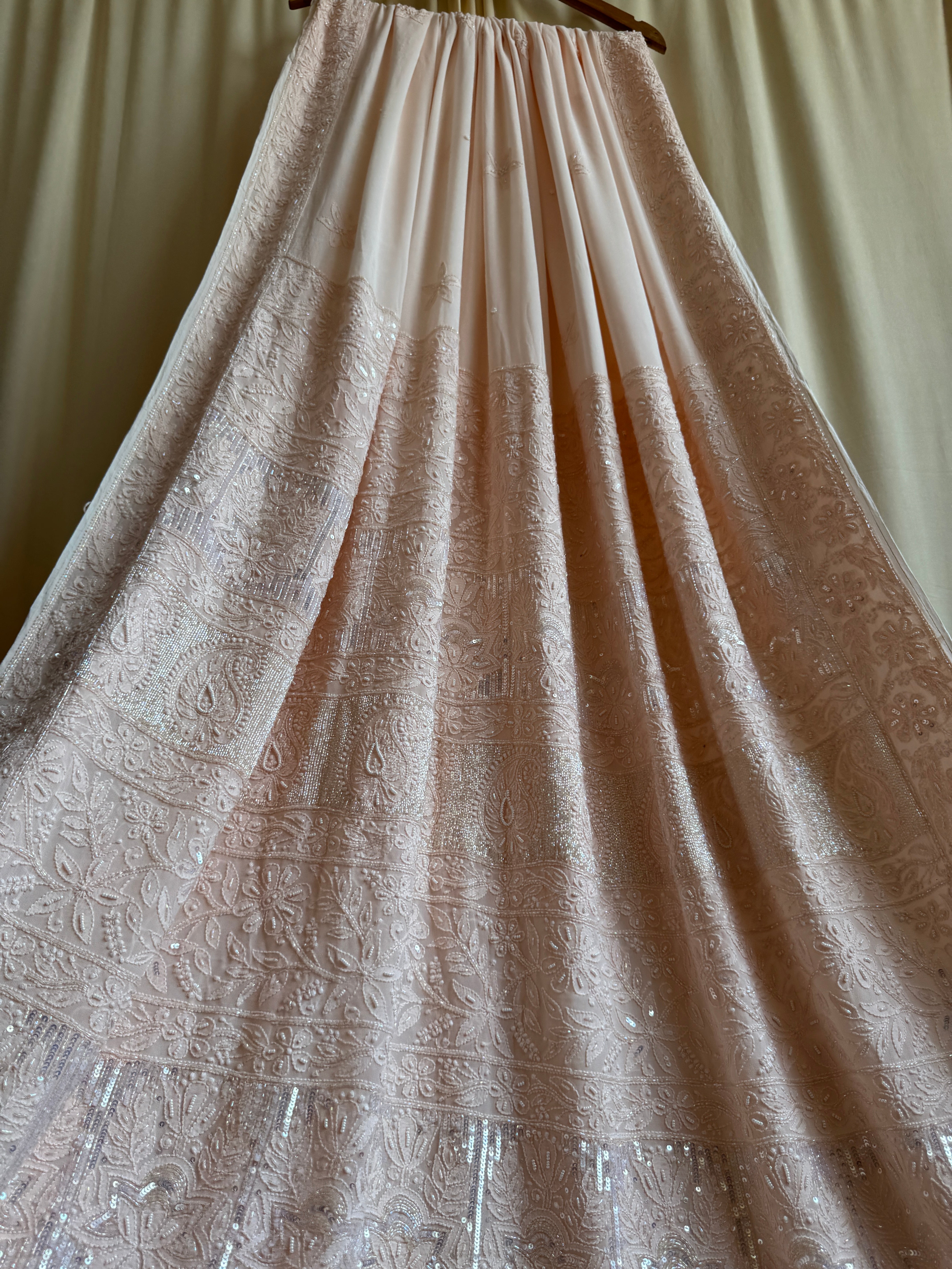 Viscose Peach Chikankari saree with Pearl embellishments