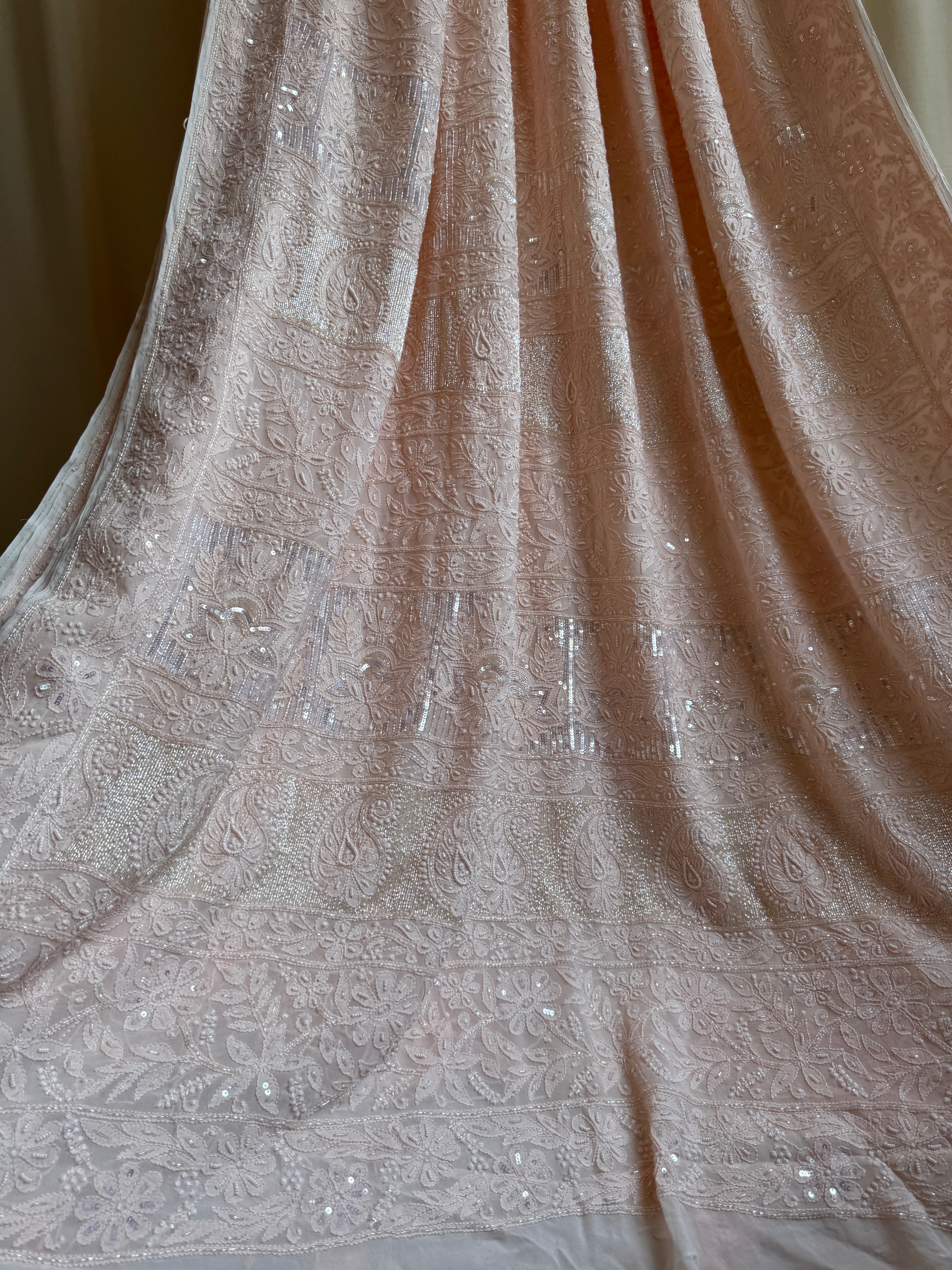 Viscose Peach Chikankari saree with Pearl embellishments