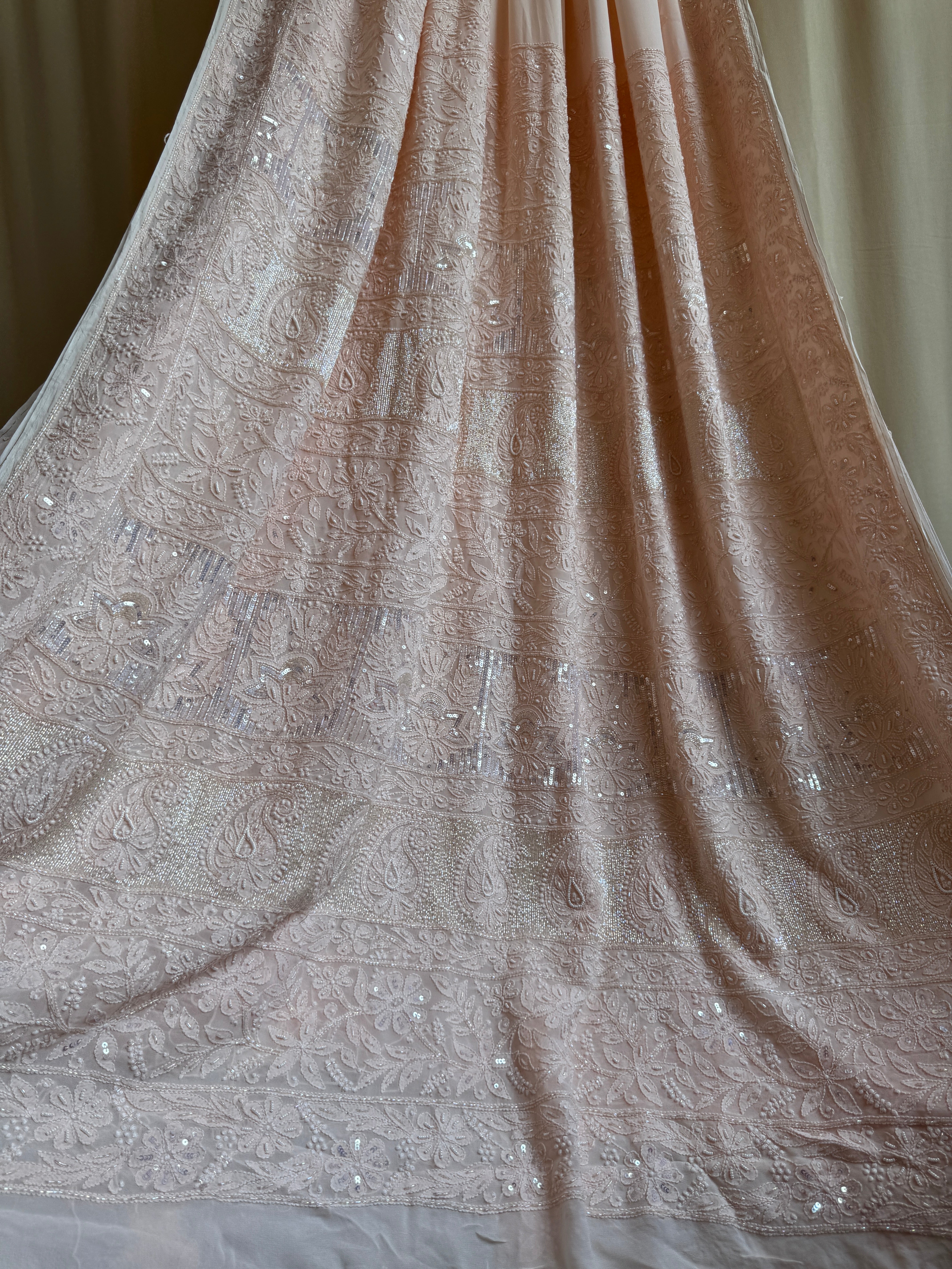 Viscose Peach Chikankari saree with Pearl embellishments