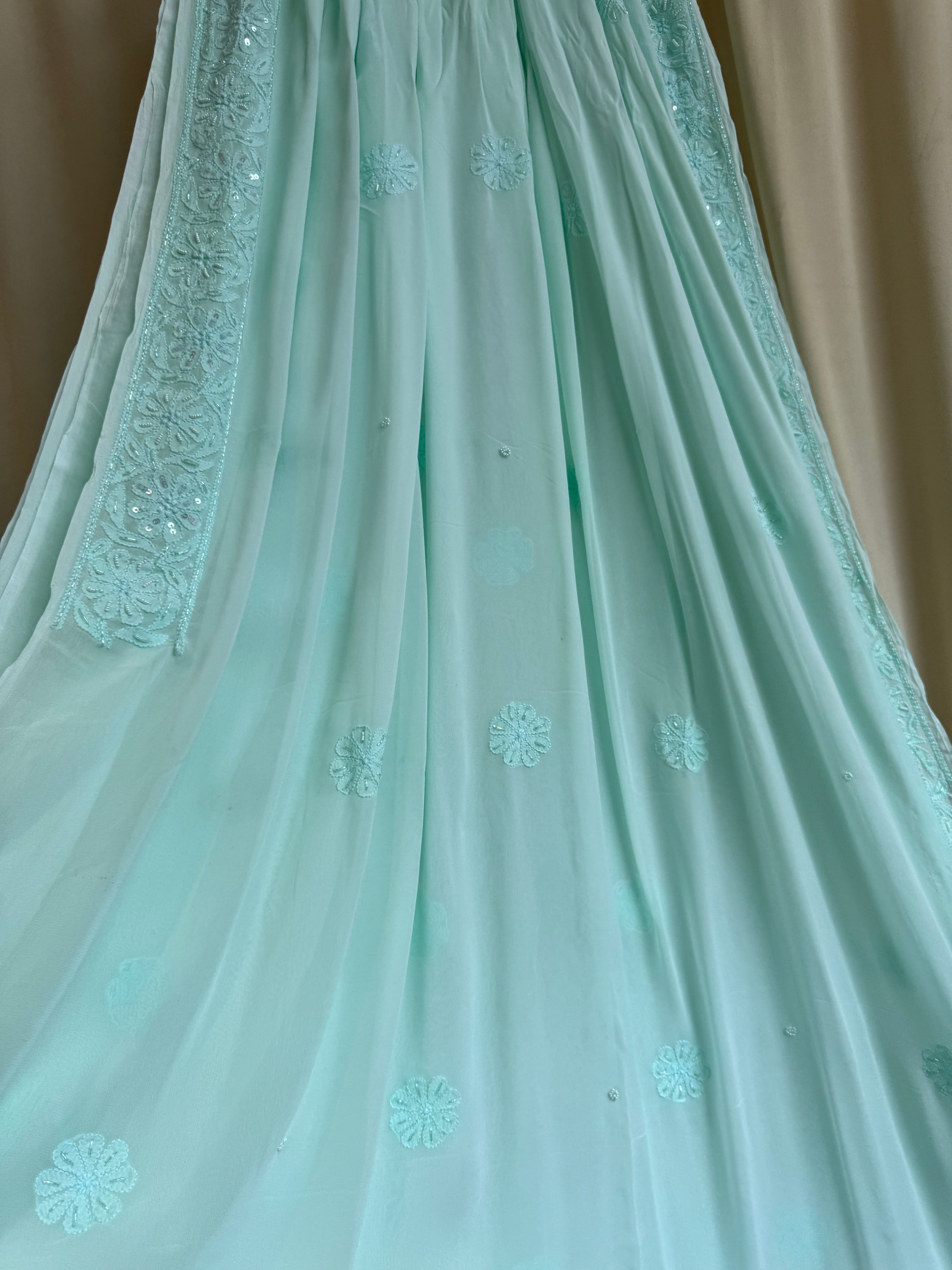 Viscose Green Chikankari saree with Pearl embellishments