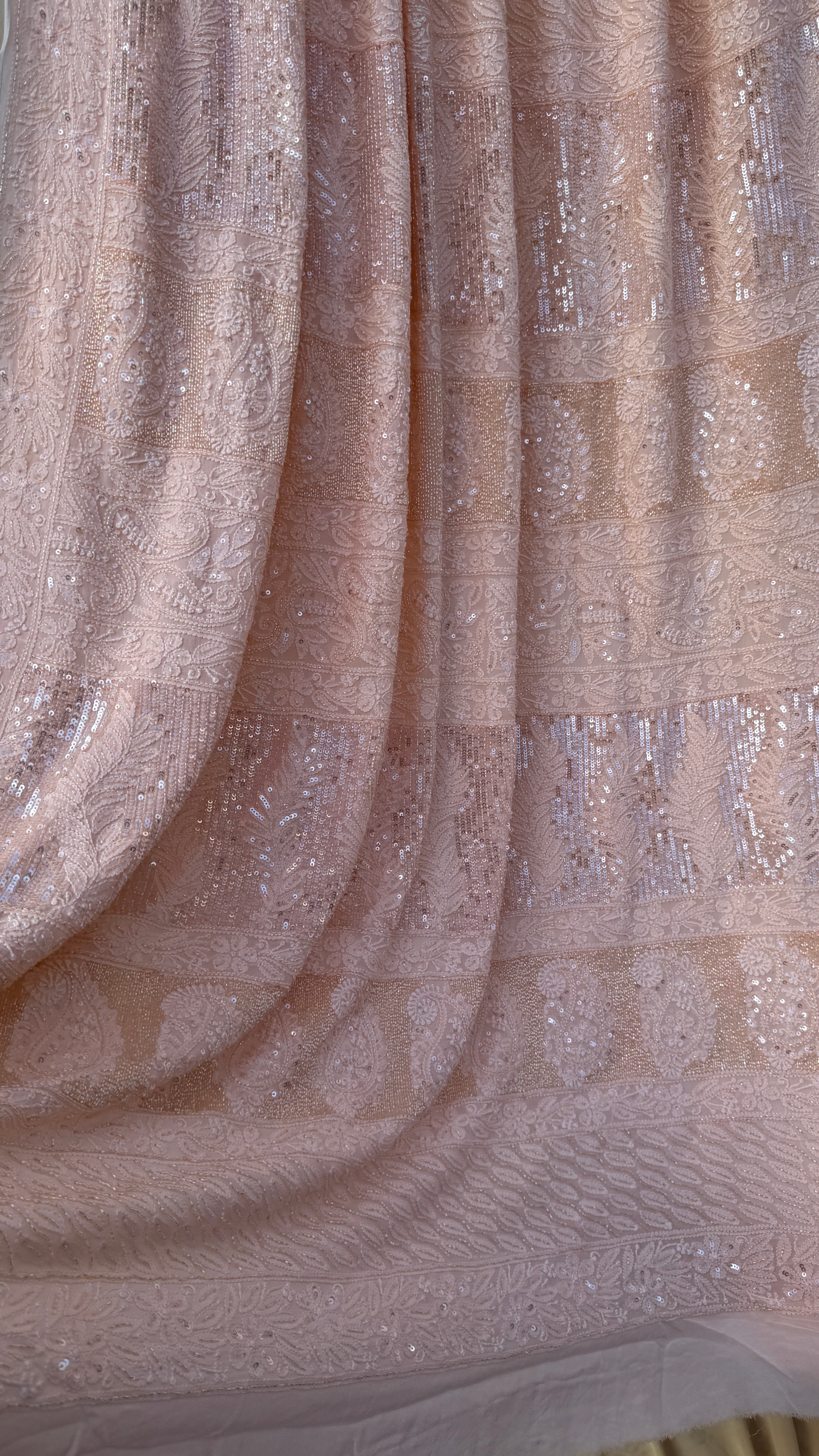 Viscose Peach Chikankari saree with Pearl embellishments