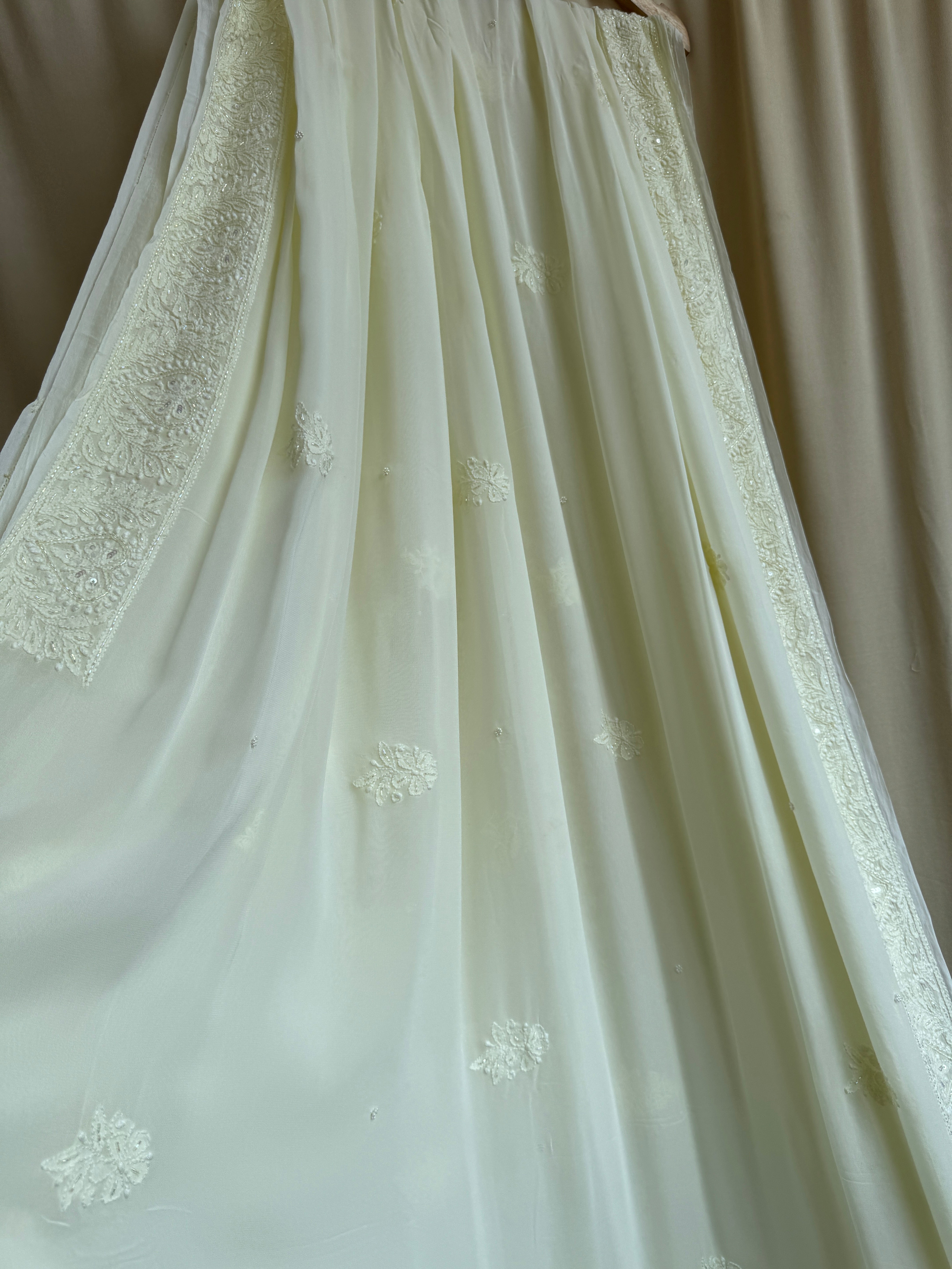 Viscose Cream Yellow Chikankari saree with Pearl embellishments