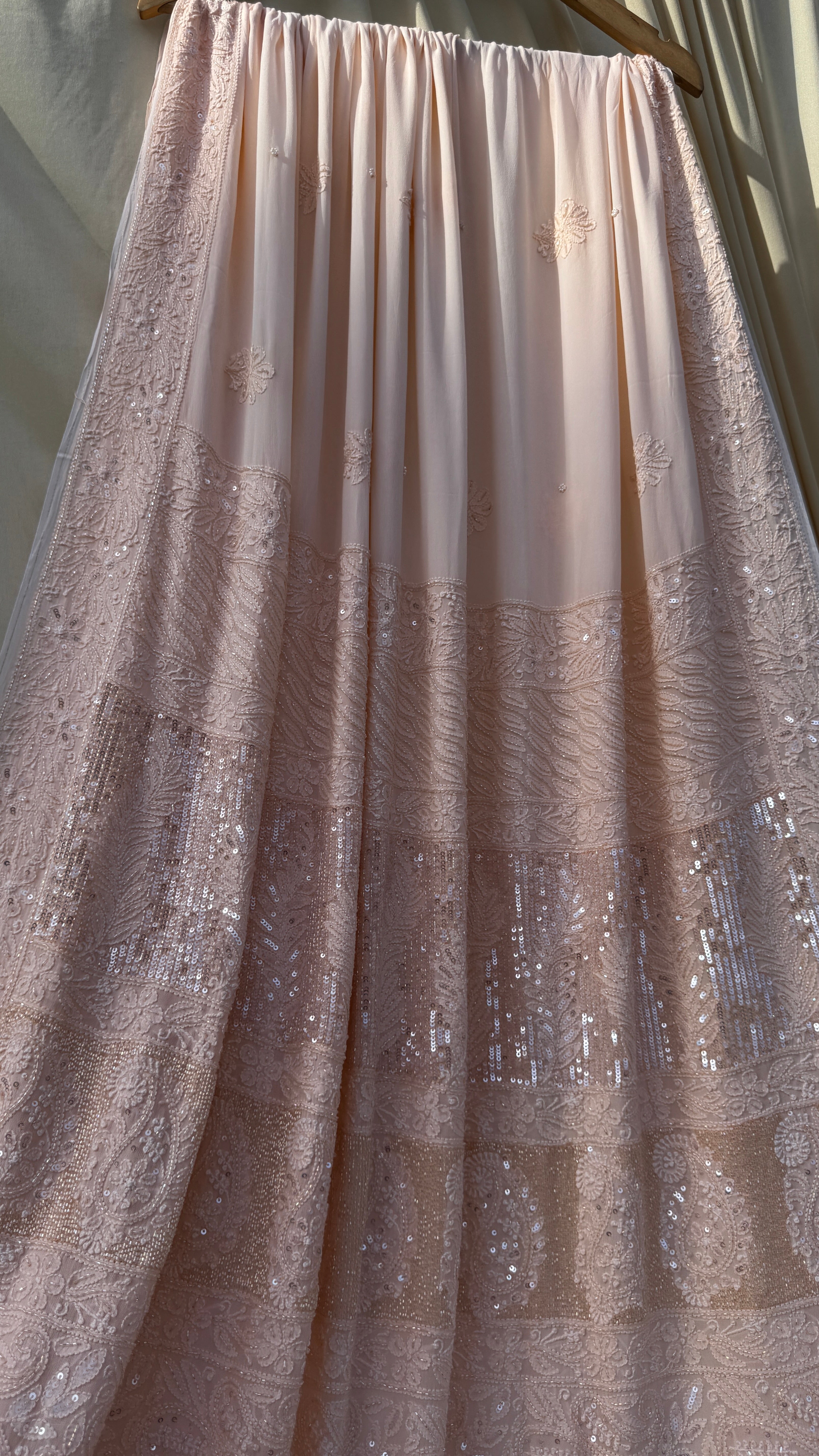 Viscose Peach Chikankari saree with Pearl embellishments