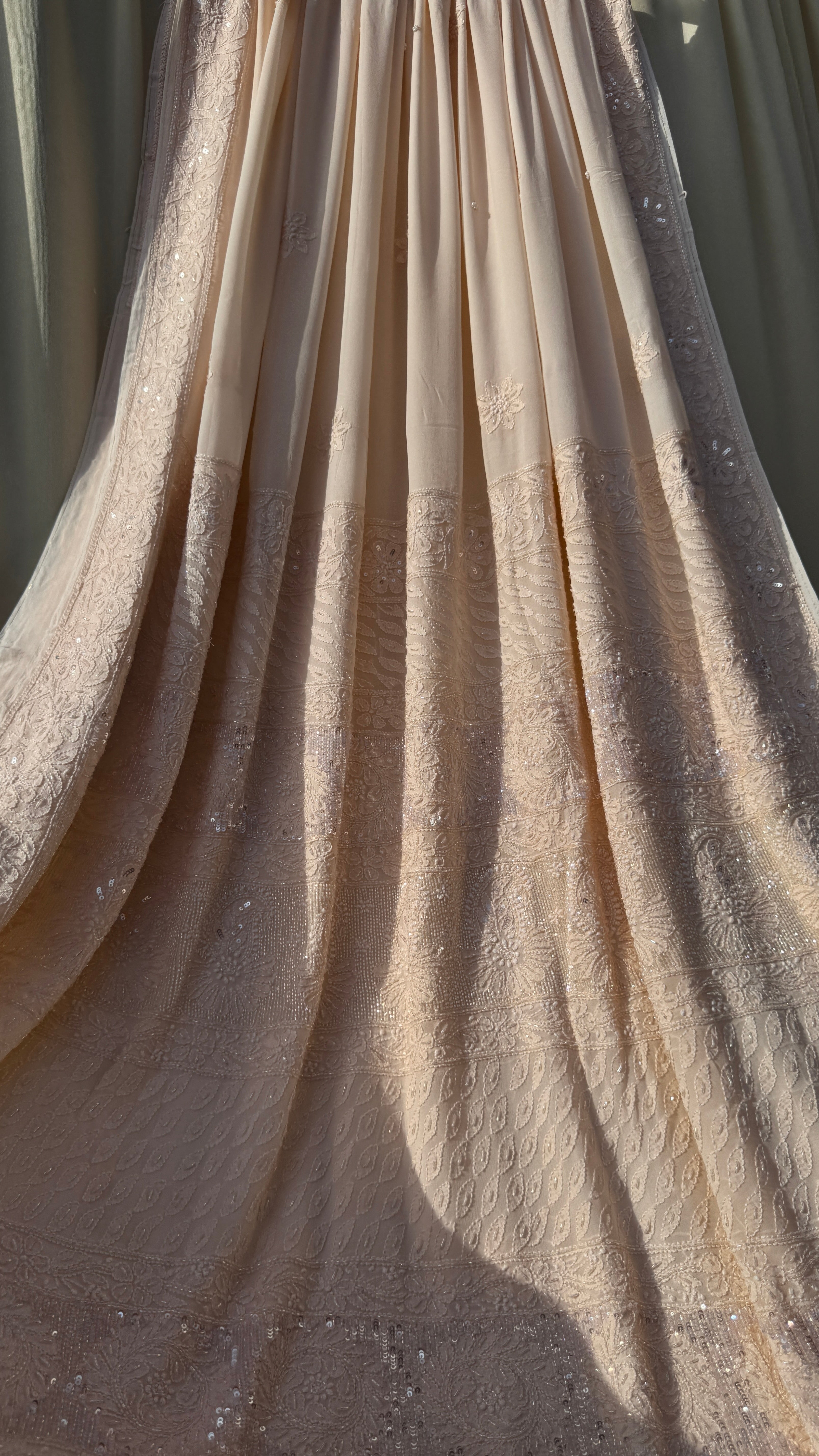 Viscose Peach Chikankari saree with Pearl embellishments