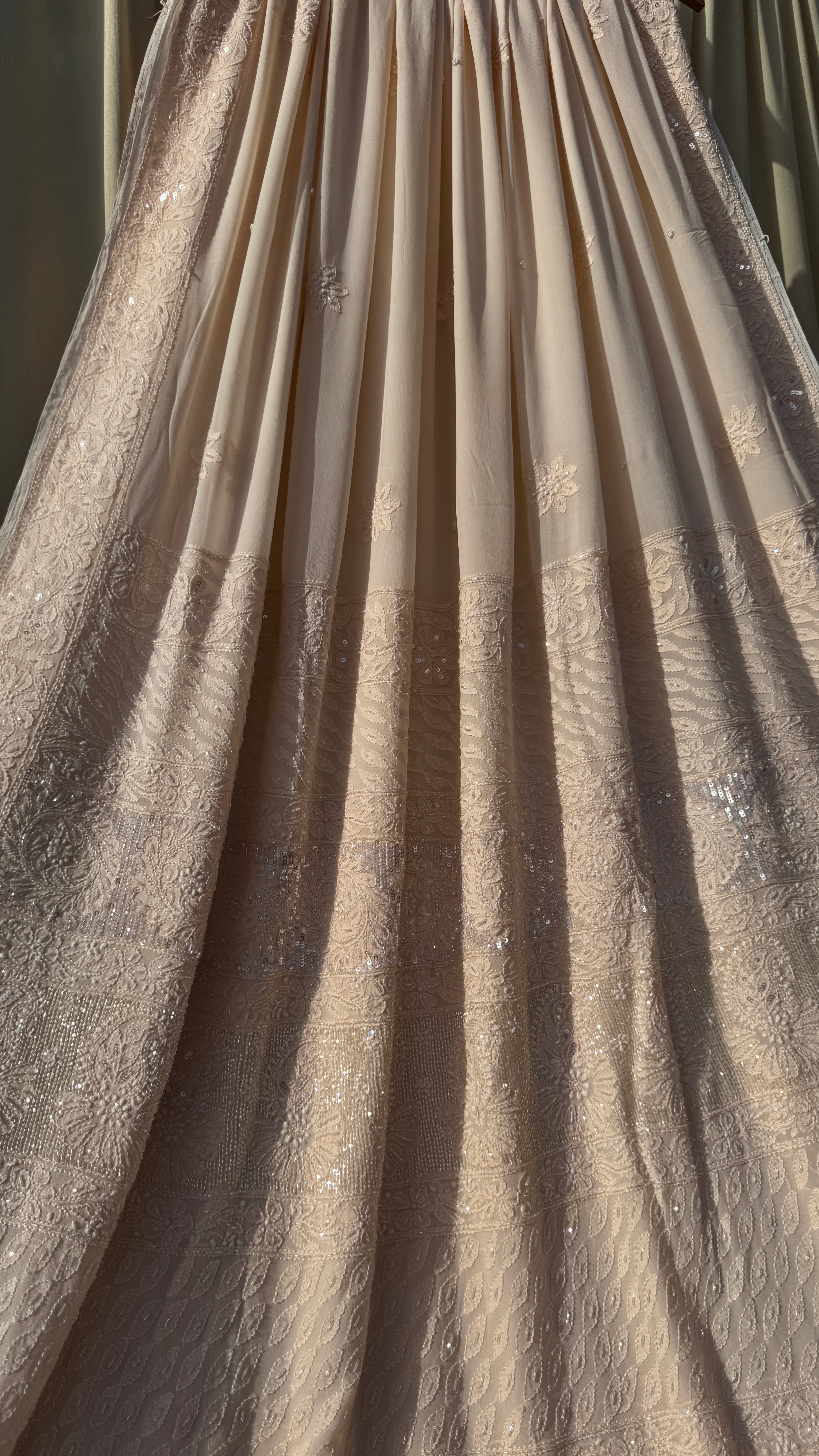 Viscose Peach Chikankari saree with Pearl embellishments