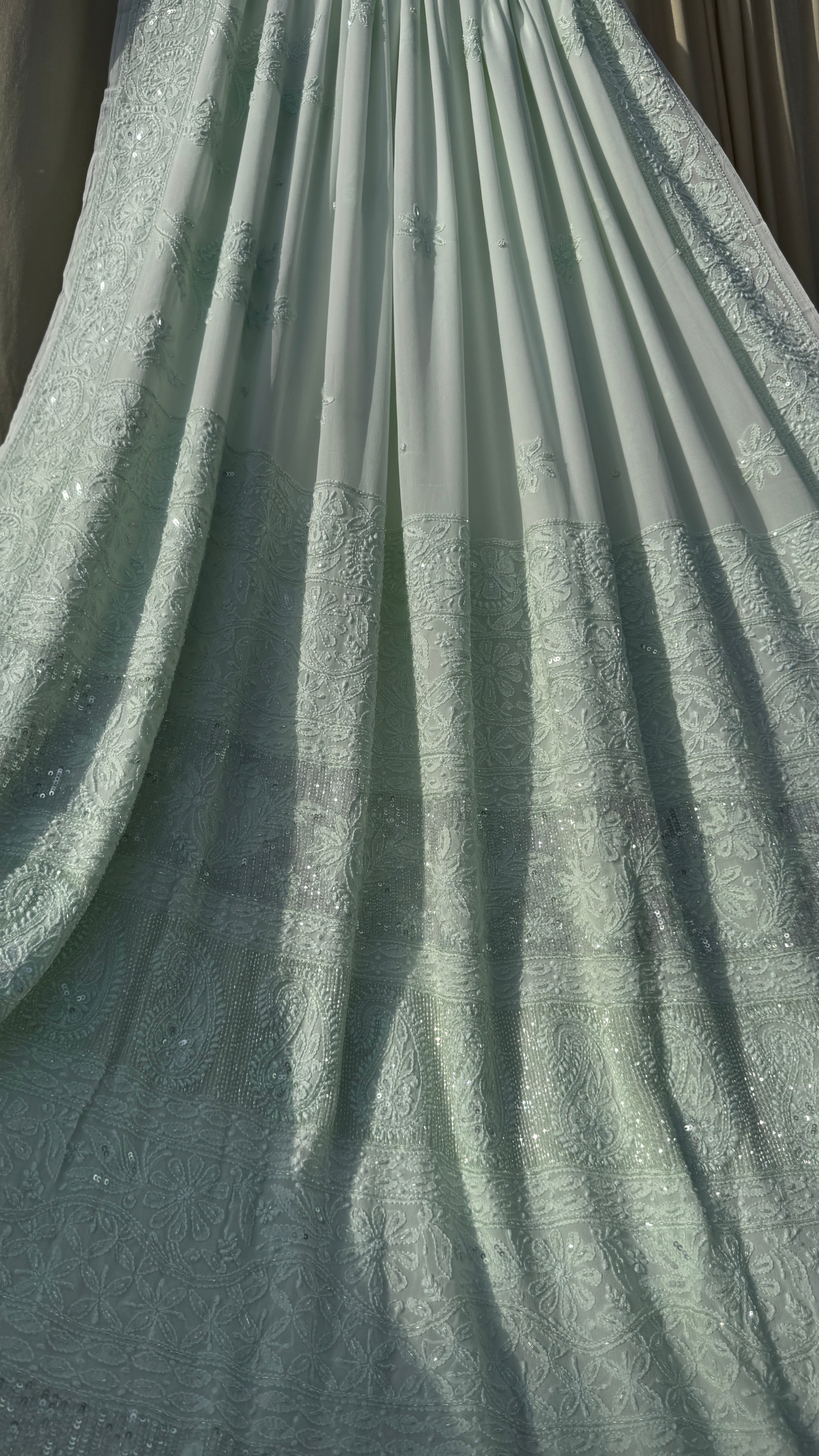 Pastel Green Chikankari saree with Pearl embellishments