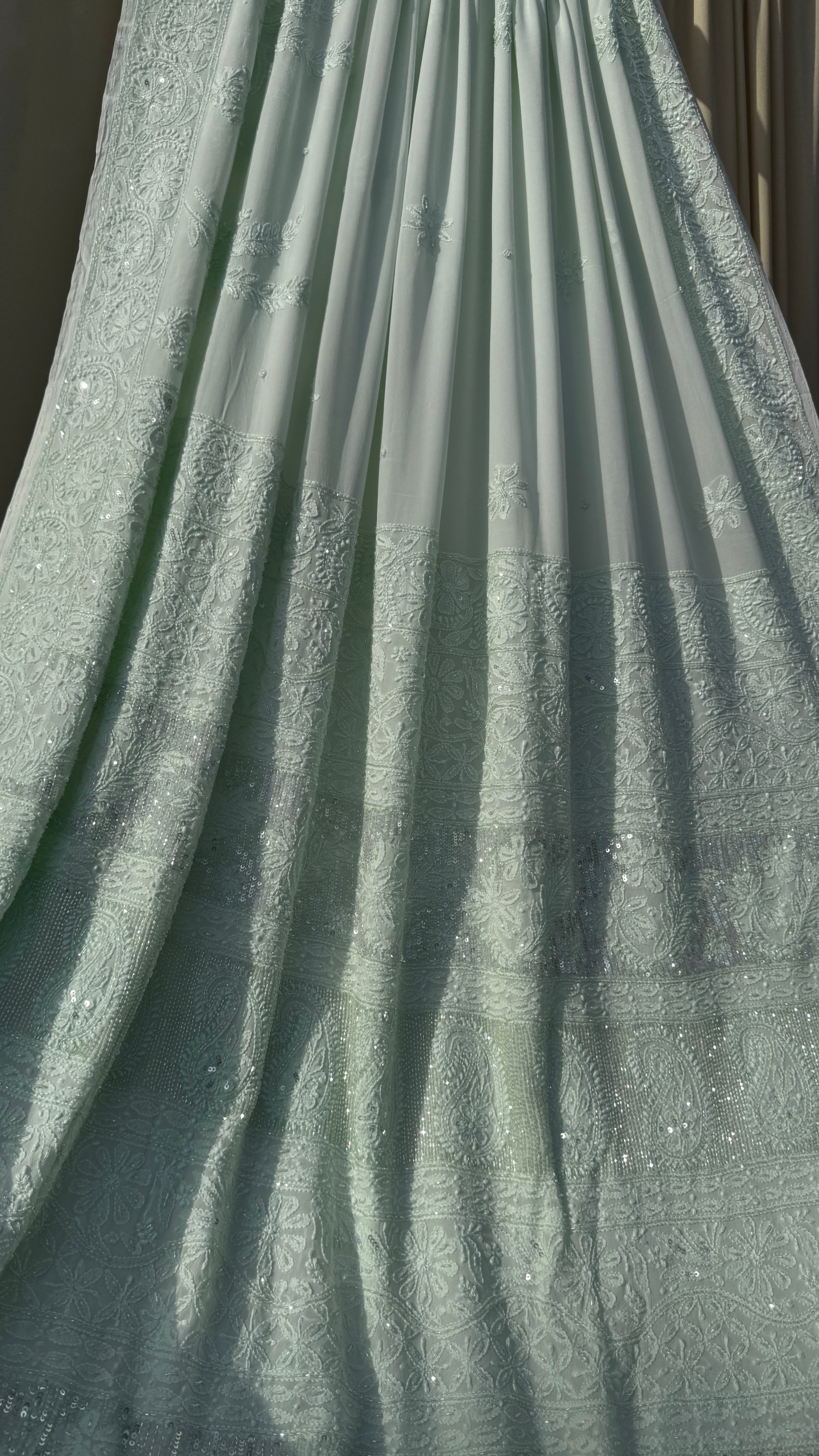 Pastel Green Chikankari saree with Pearl embellishments
