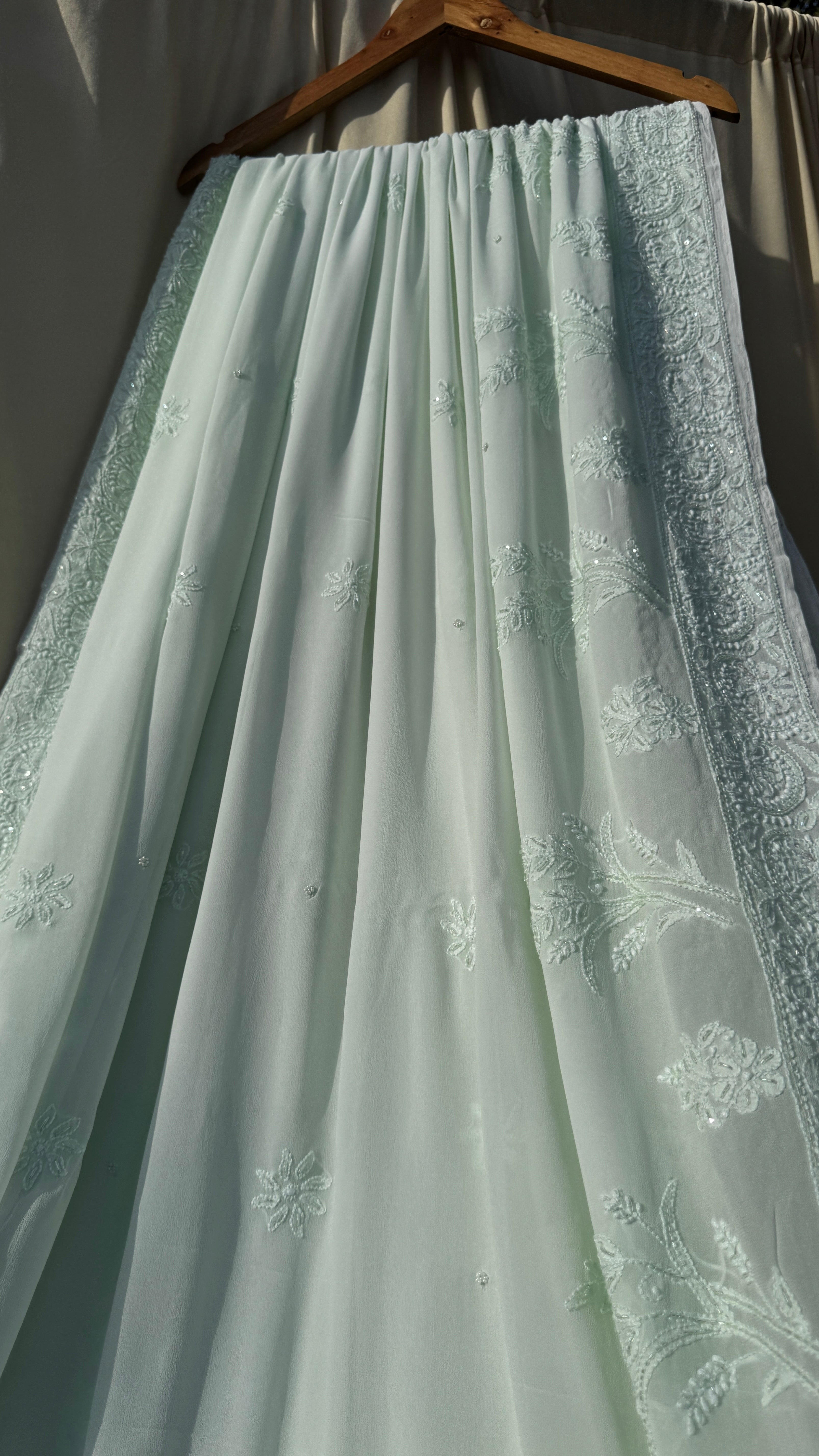 Pastel Green Chikankari saree with Pearl embellishments