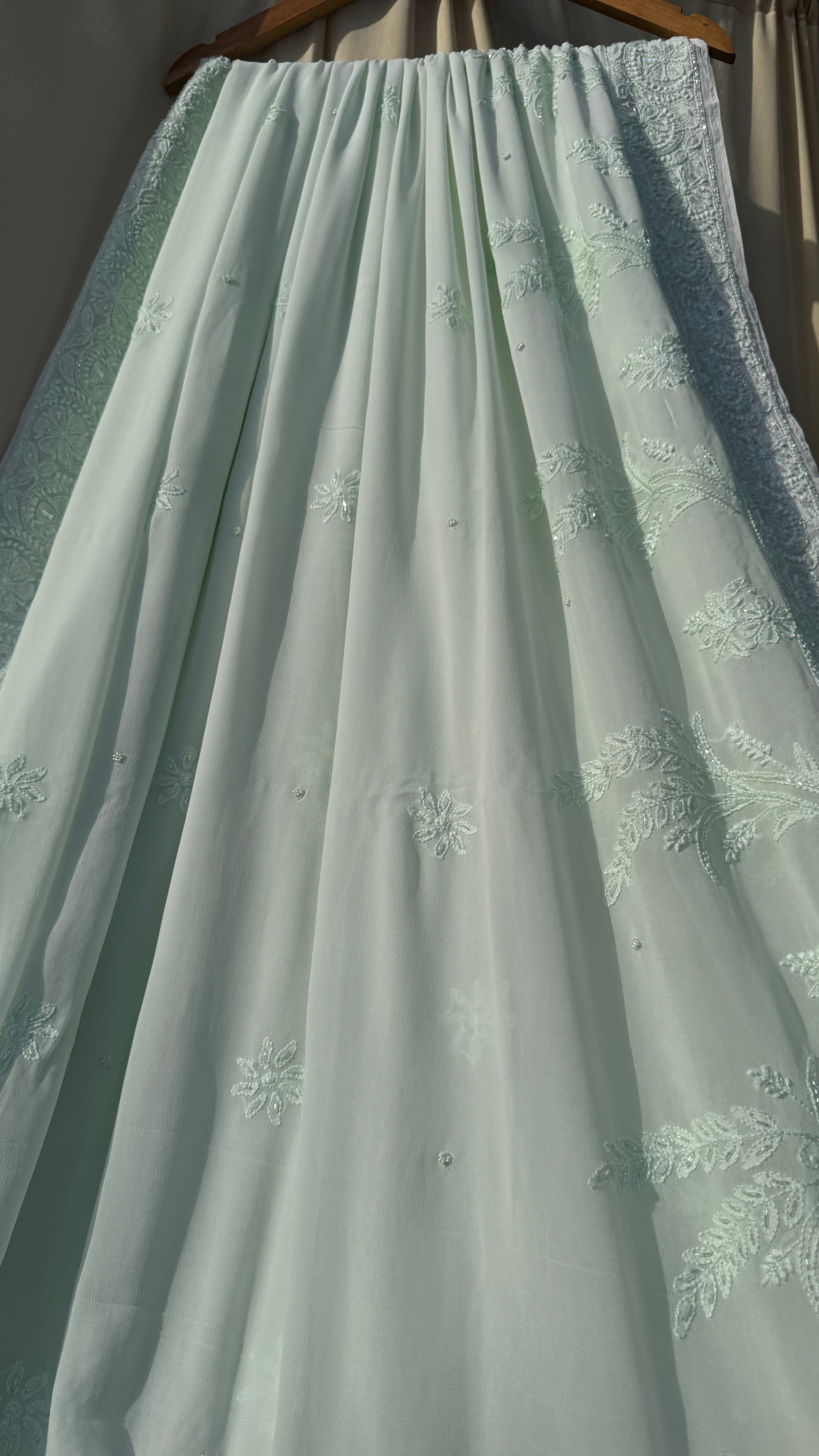 Pastel Green Chikankari saree with Pearl embellishments