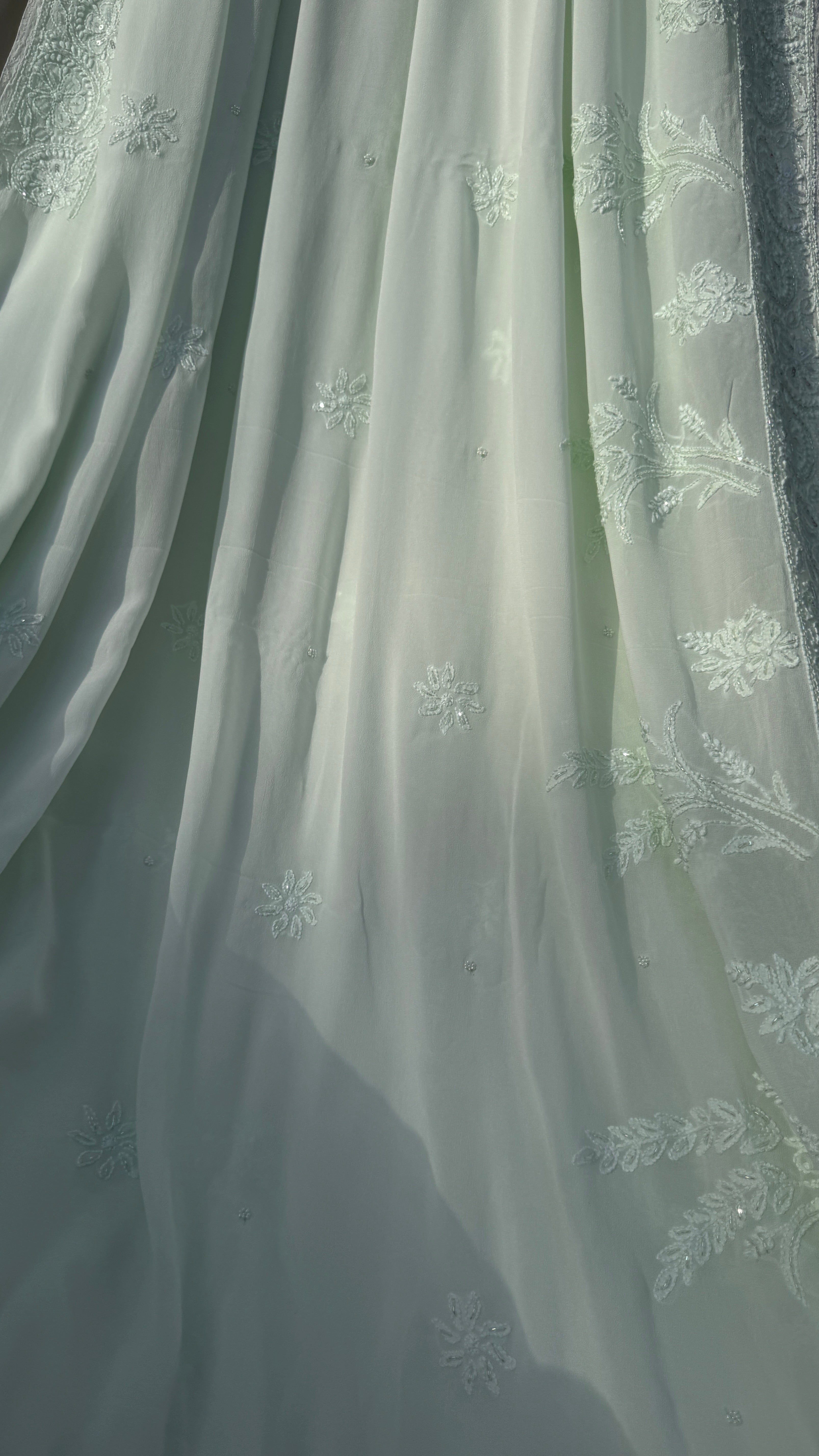 Pastel Green Chikankari saree with Pearl embellishments