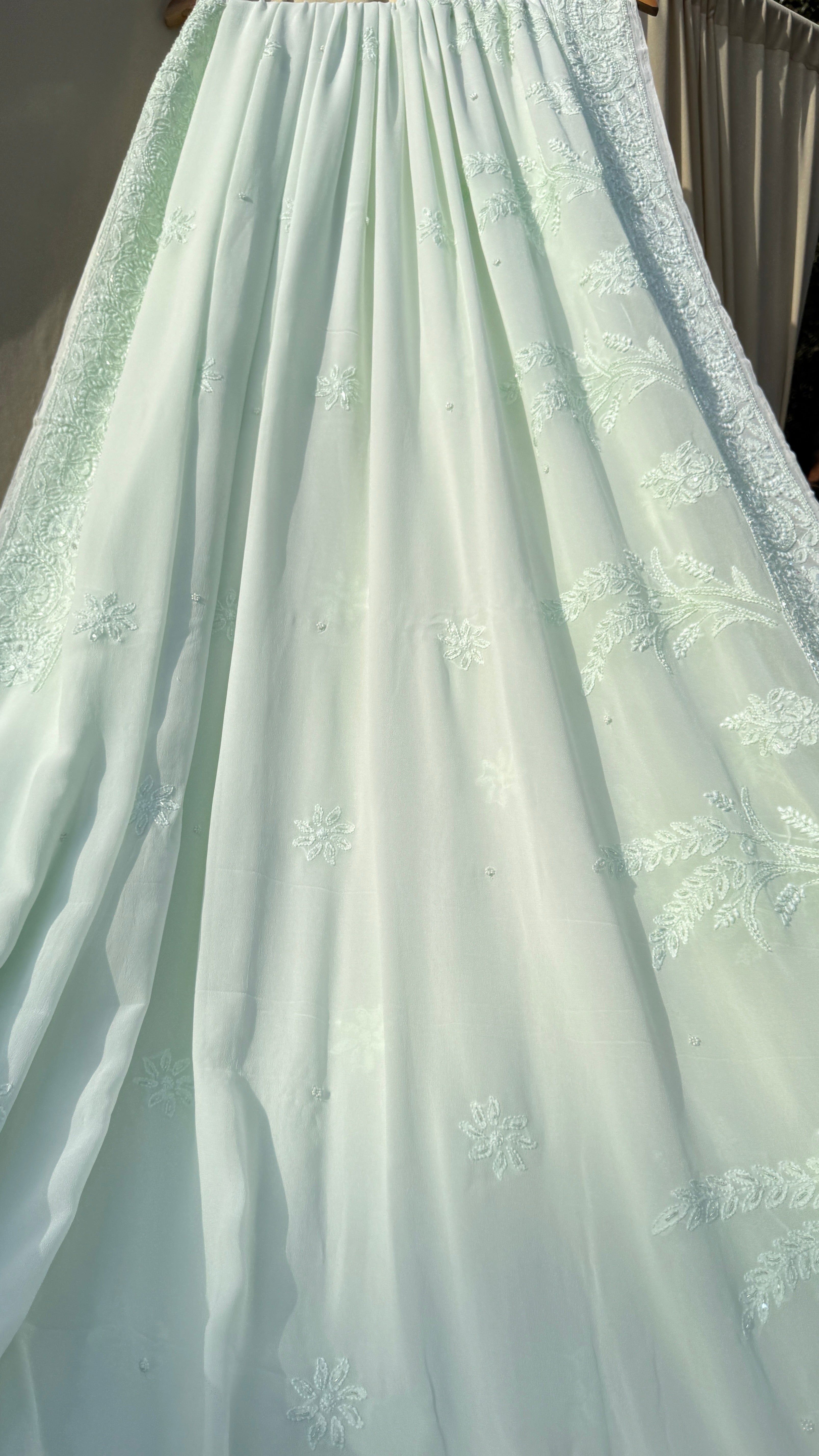 Pastel Green Chikankari saree with Pearl embellishments