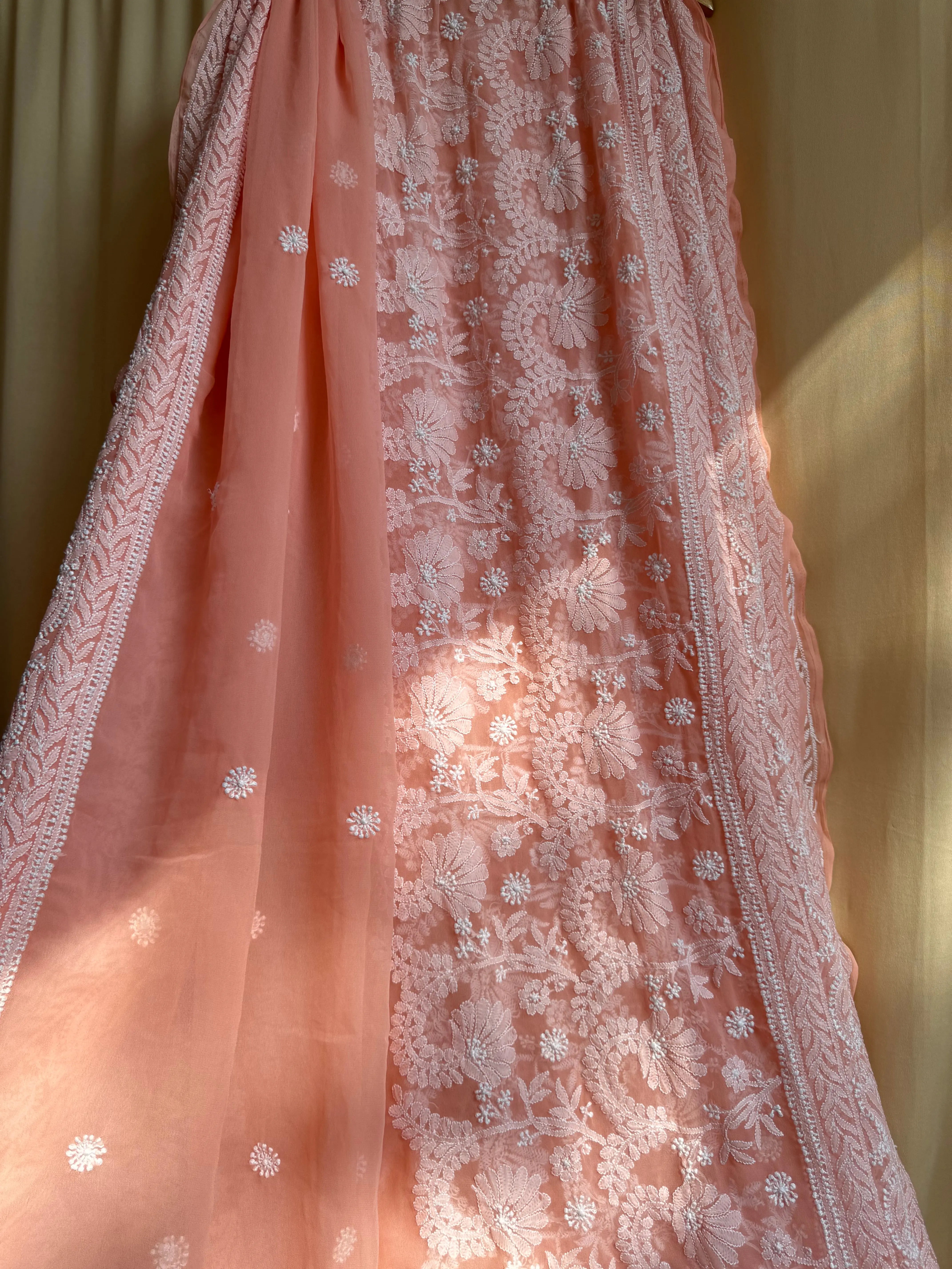 Georgette Chikankari saree in Peach ARIAA CHIKANKARI 