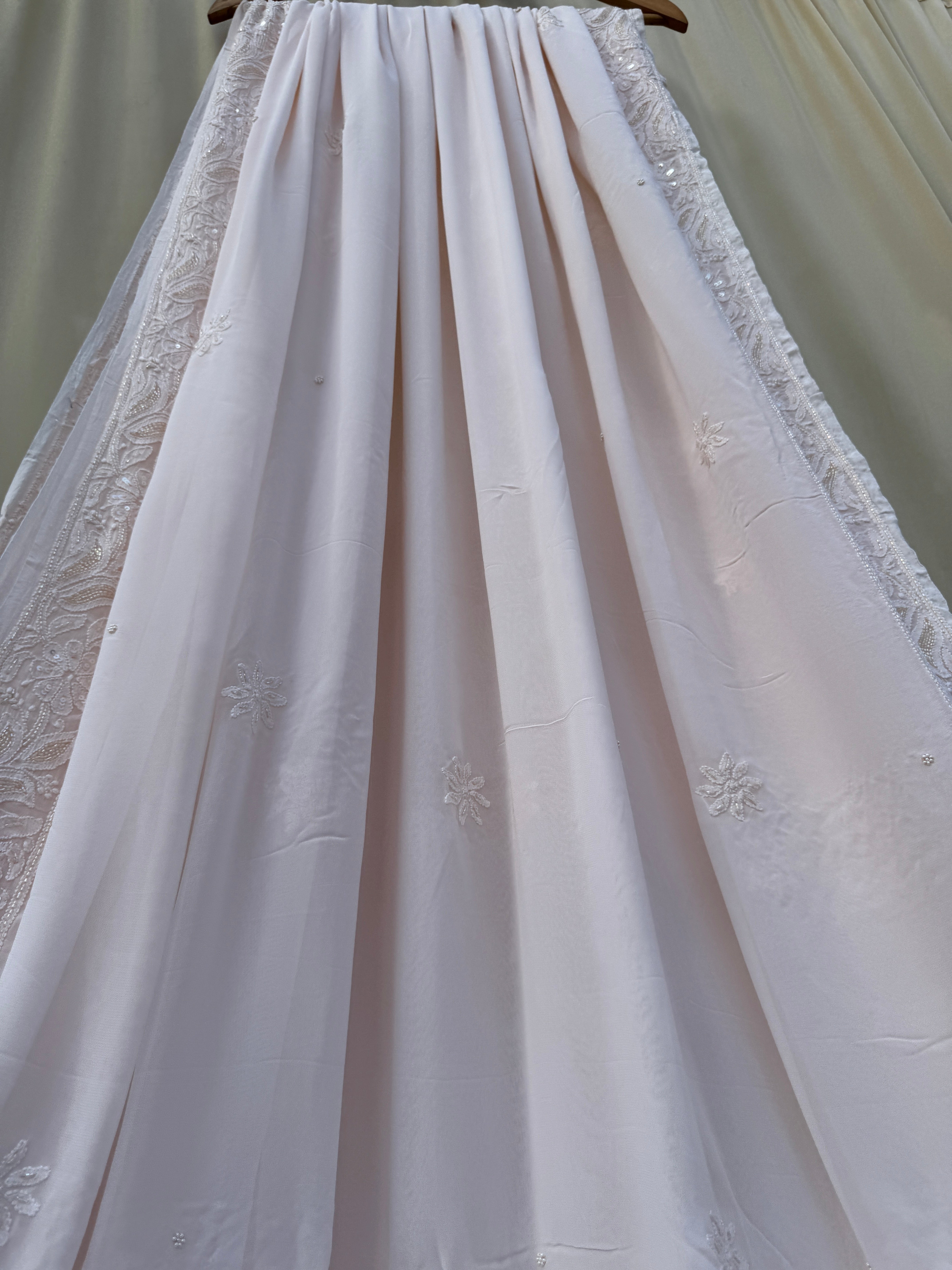 Viscose Peach Dust Chikankari saree with Pearl embellishments