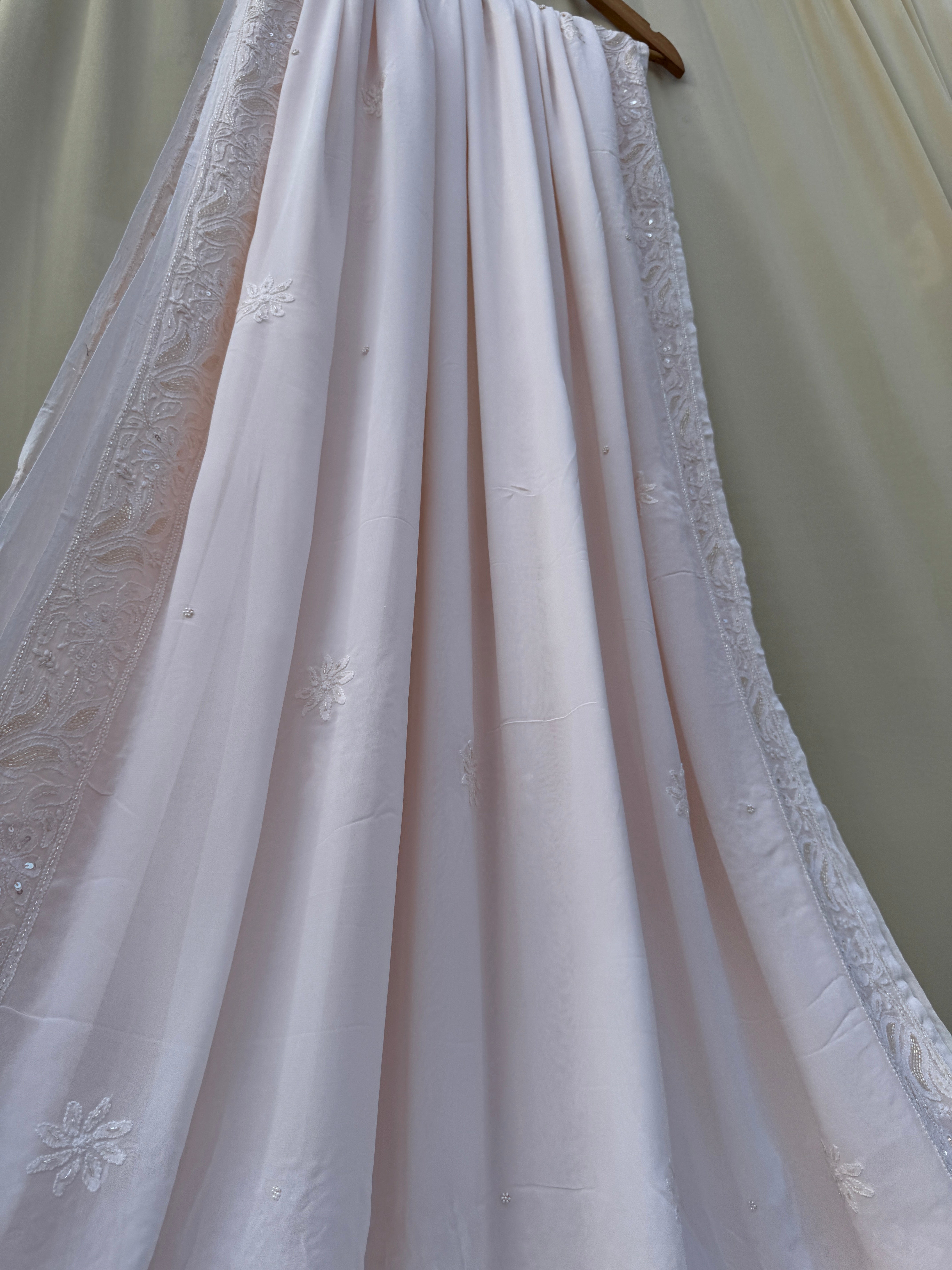 Viscose Peach Dust Chikankari saree with Pearl embellishments