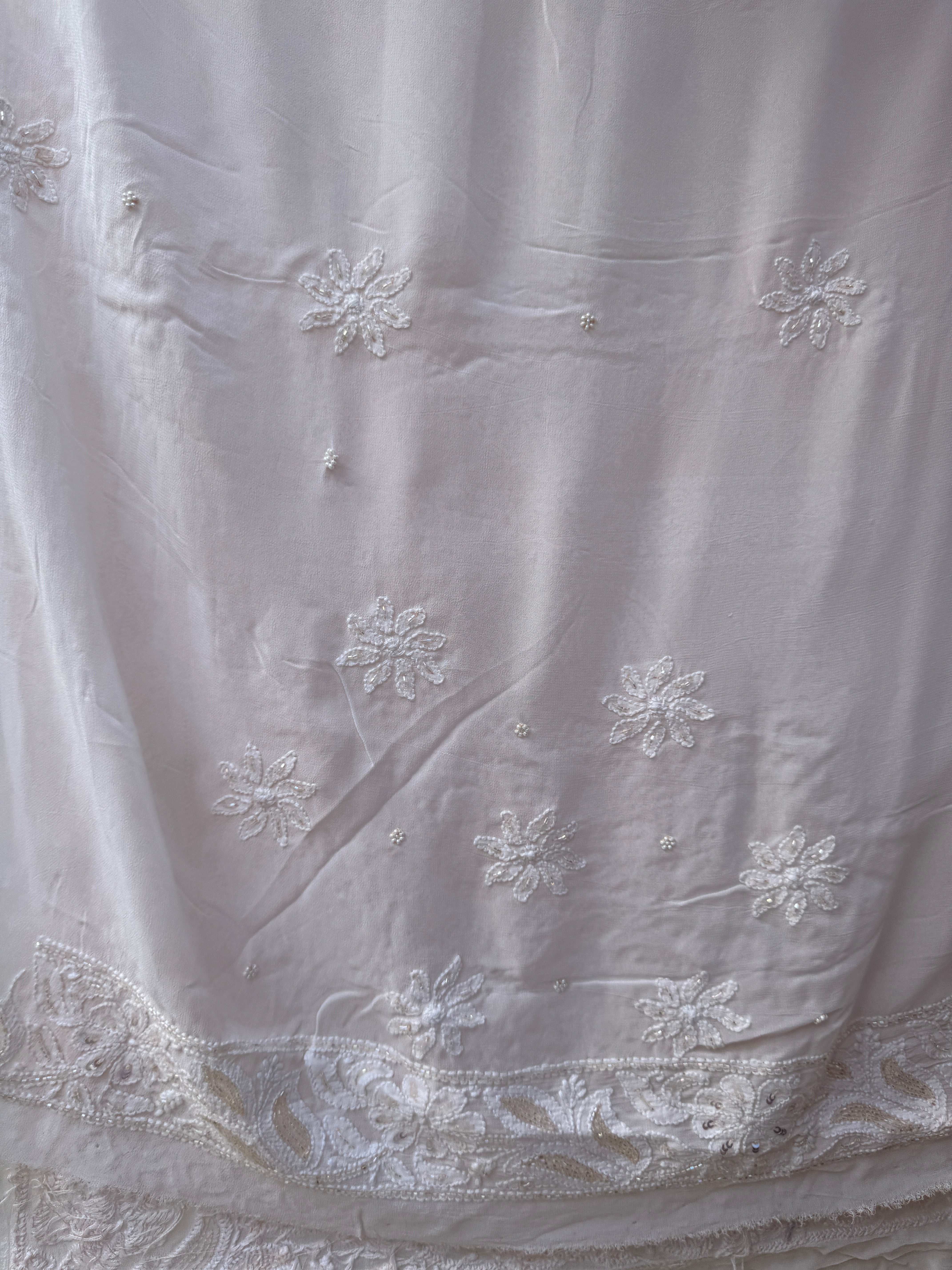 Viscose Peach Dust Chikankari saree with Pearl embellishments