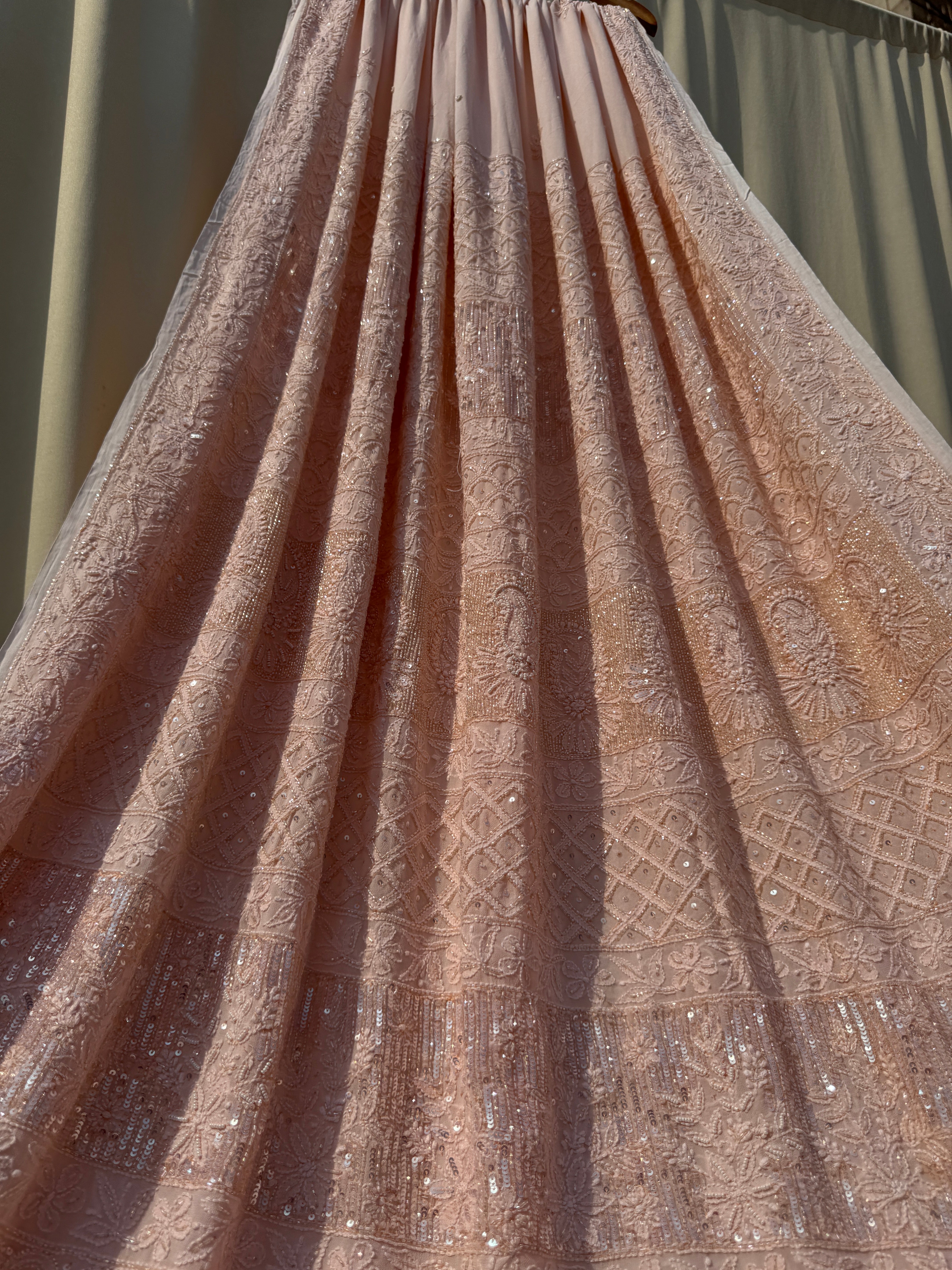 Viscose Peach Chikankari saree with Pearl embellishments