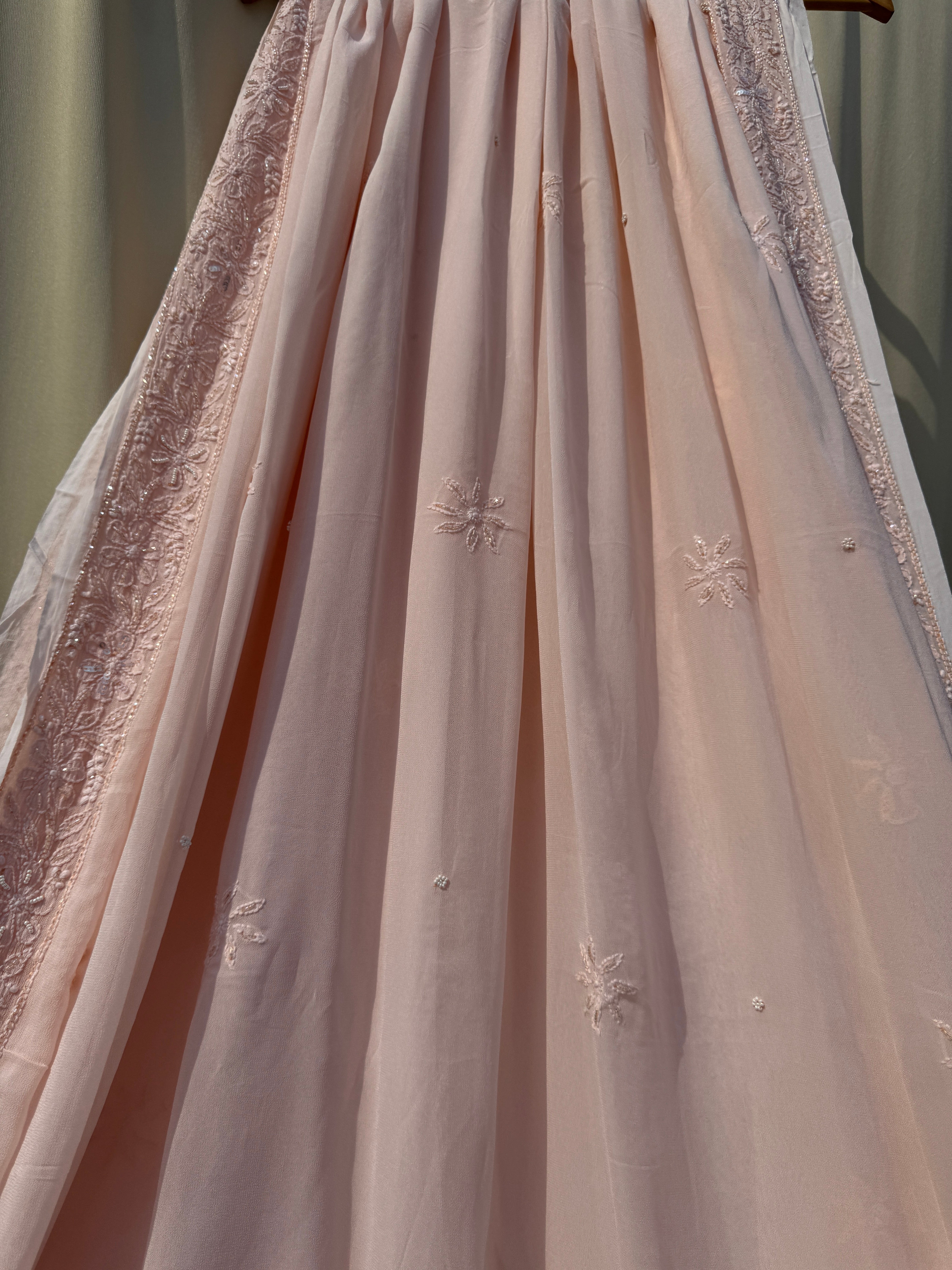 Viscose Peach Chikankari saree with Pearl embellishments