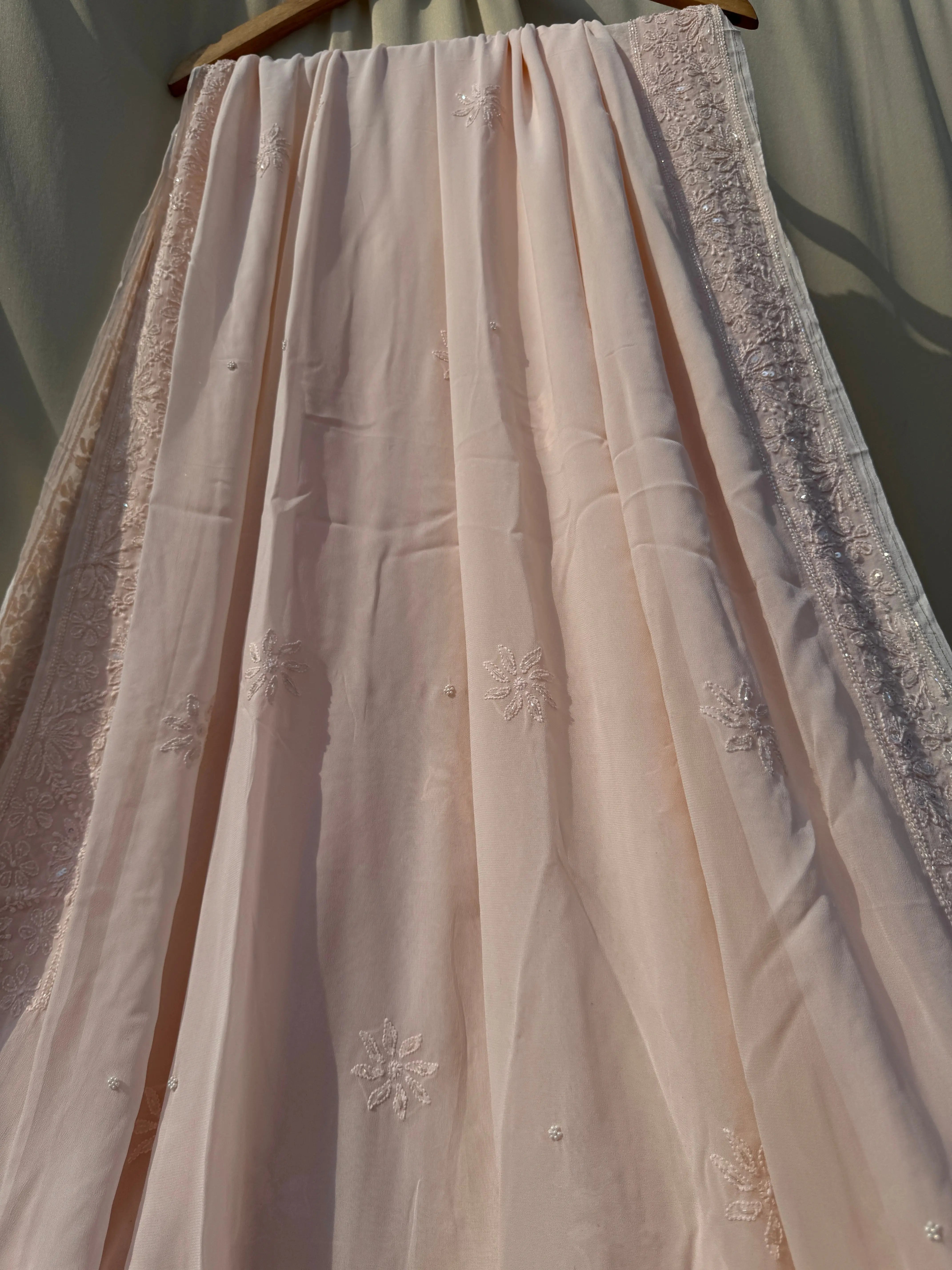 Viscose Peach Chikankari saree with Pearl embellishments ARIAA CHIKANKARI 