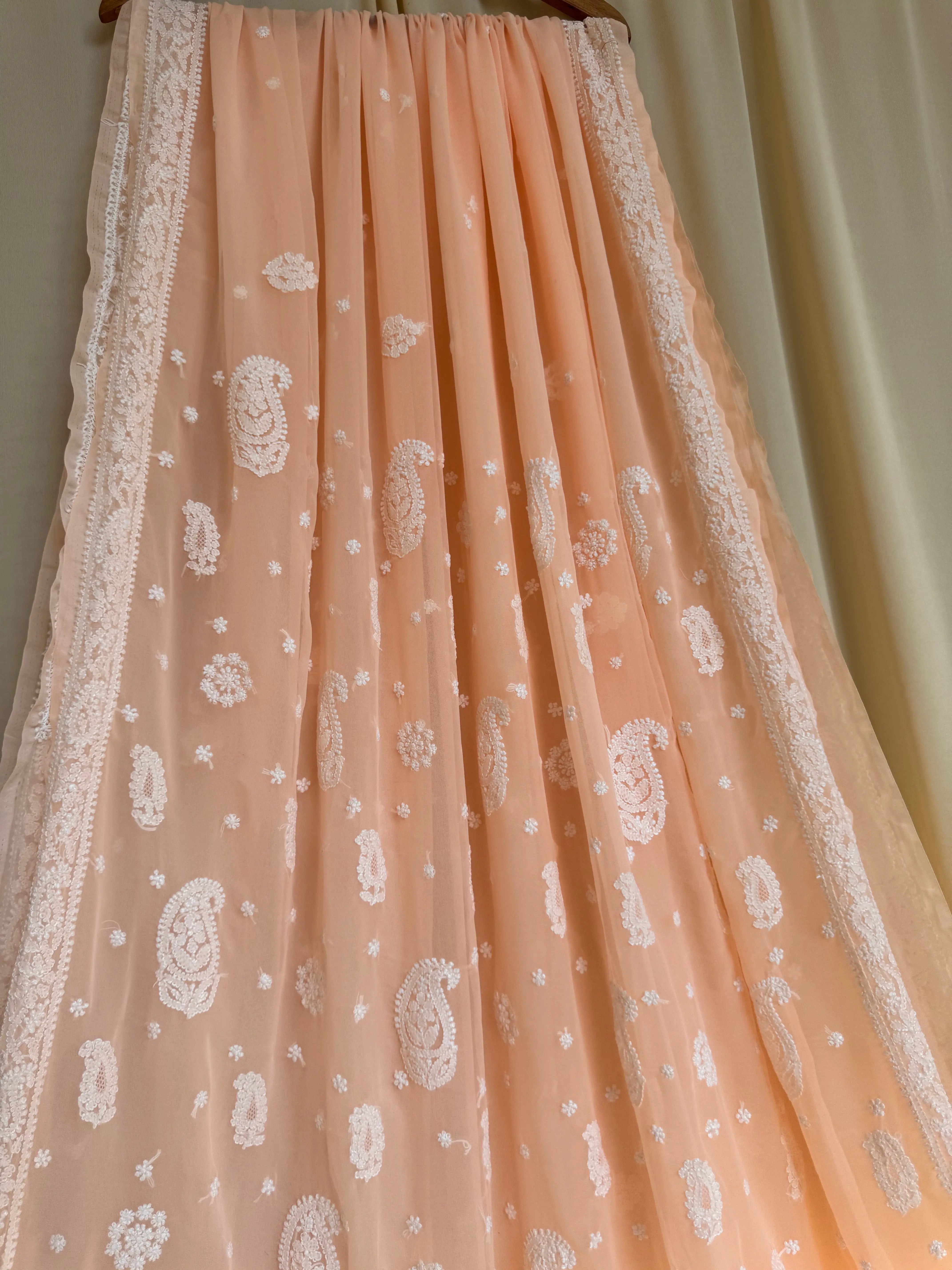 Georgette Chikankari saree in Peach ARIAA CHIKANKARI 