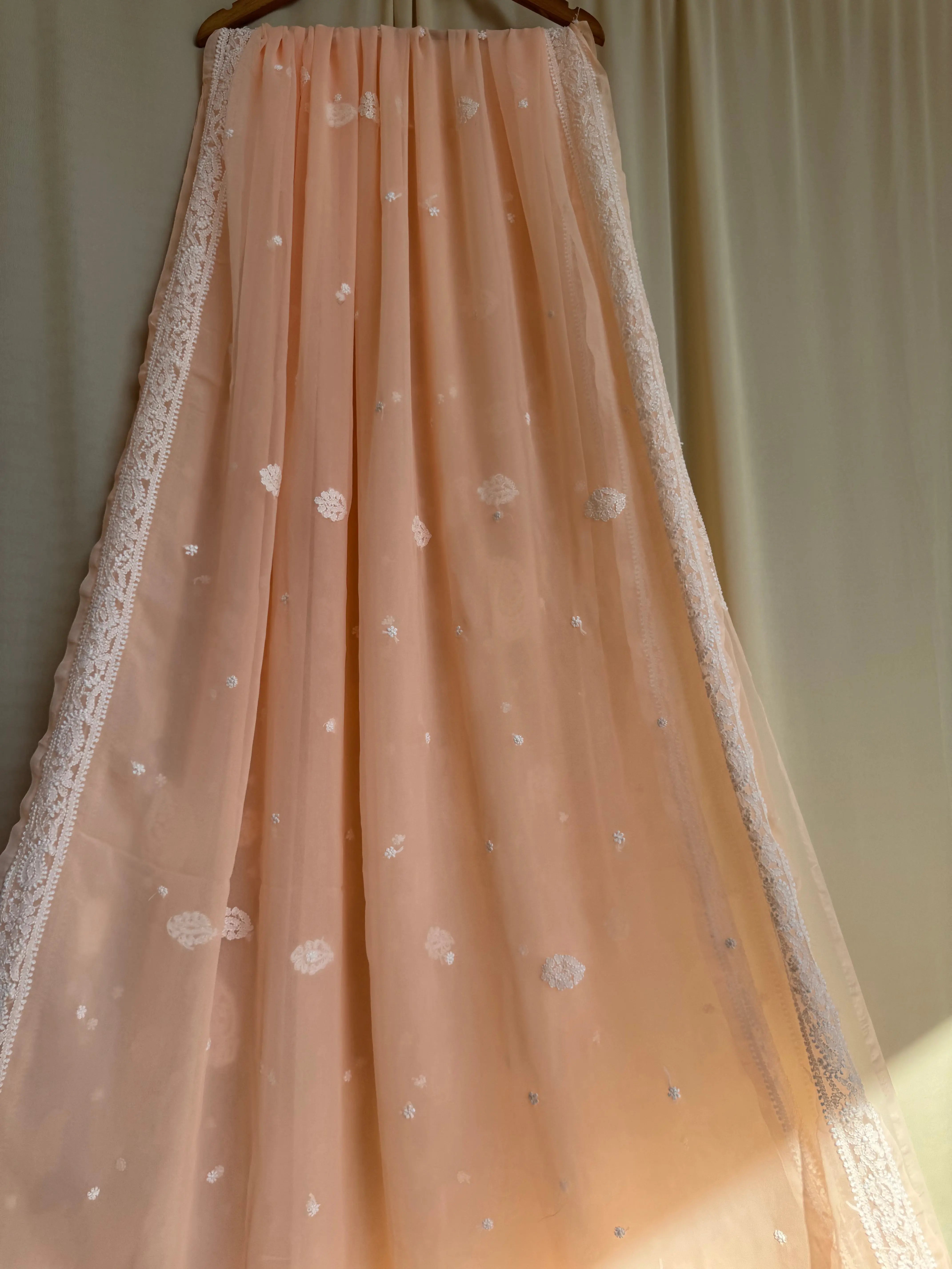 Georgette Chikankari saree in Peach ARIAA CHIKANKARI 