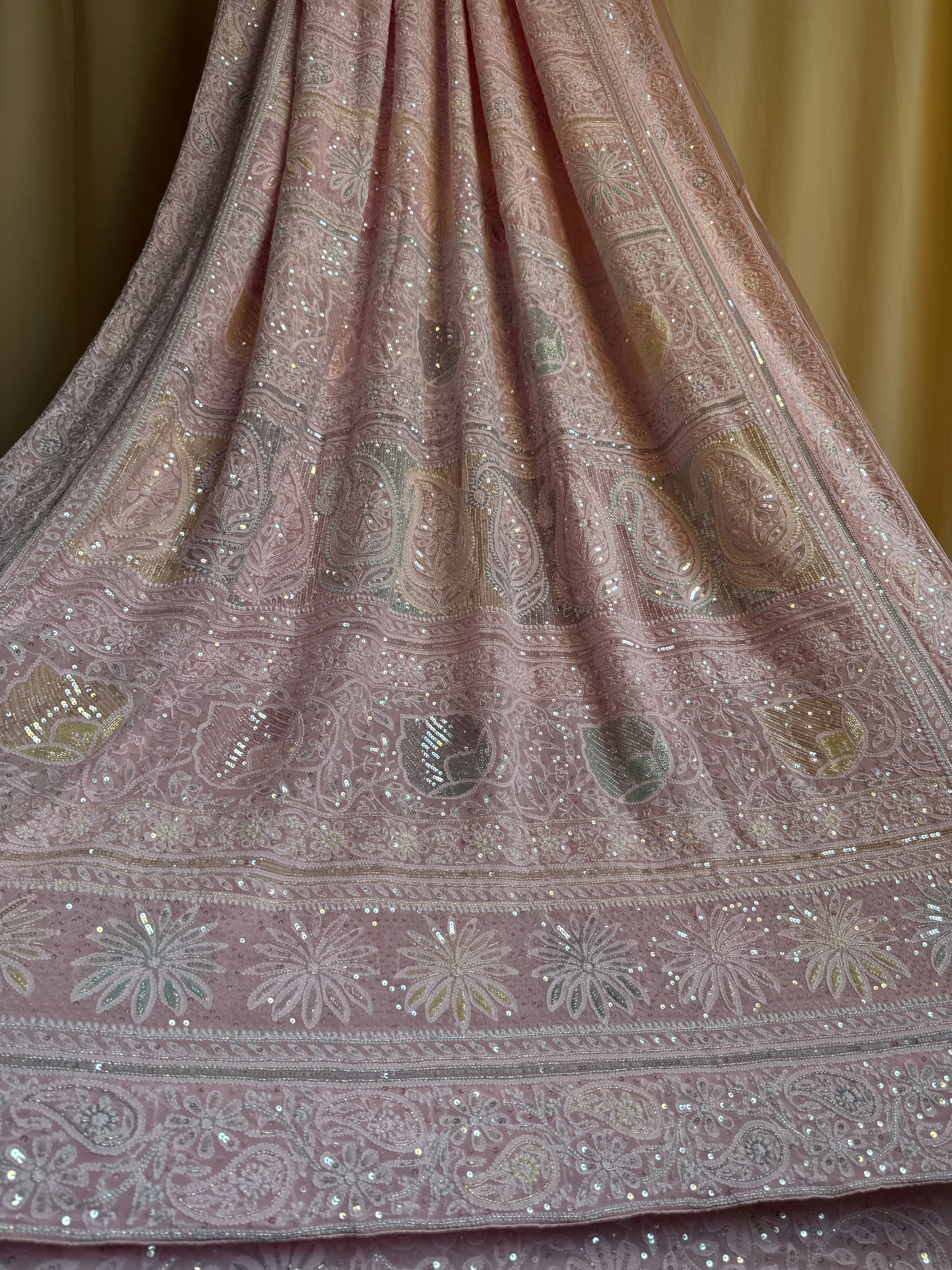   Luxury pure georgette white chikankari saree with intricate hand embroidery, handcrafted by artisans in Lucknow ARIAA CHIKANKARI 