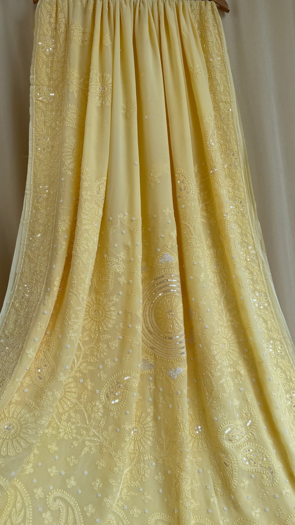 Cream Yellow Chikankari saree with Pearl embellishments
