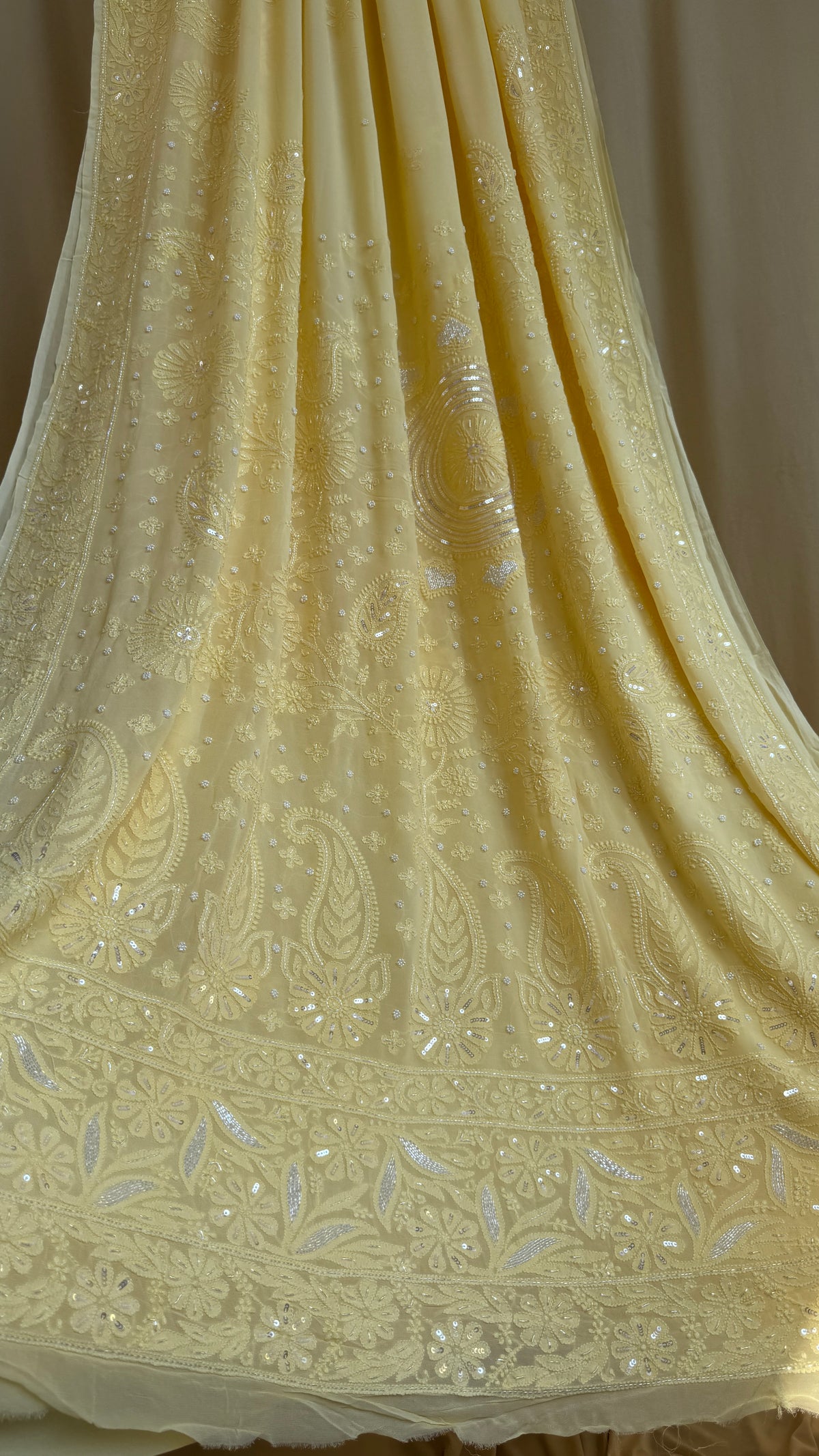 Cream Yellow Chikankari saree with Pearl embellishments