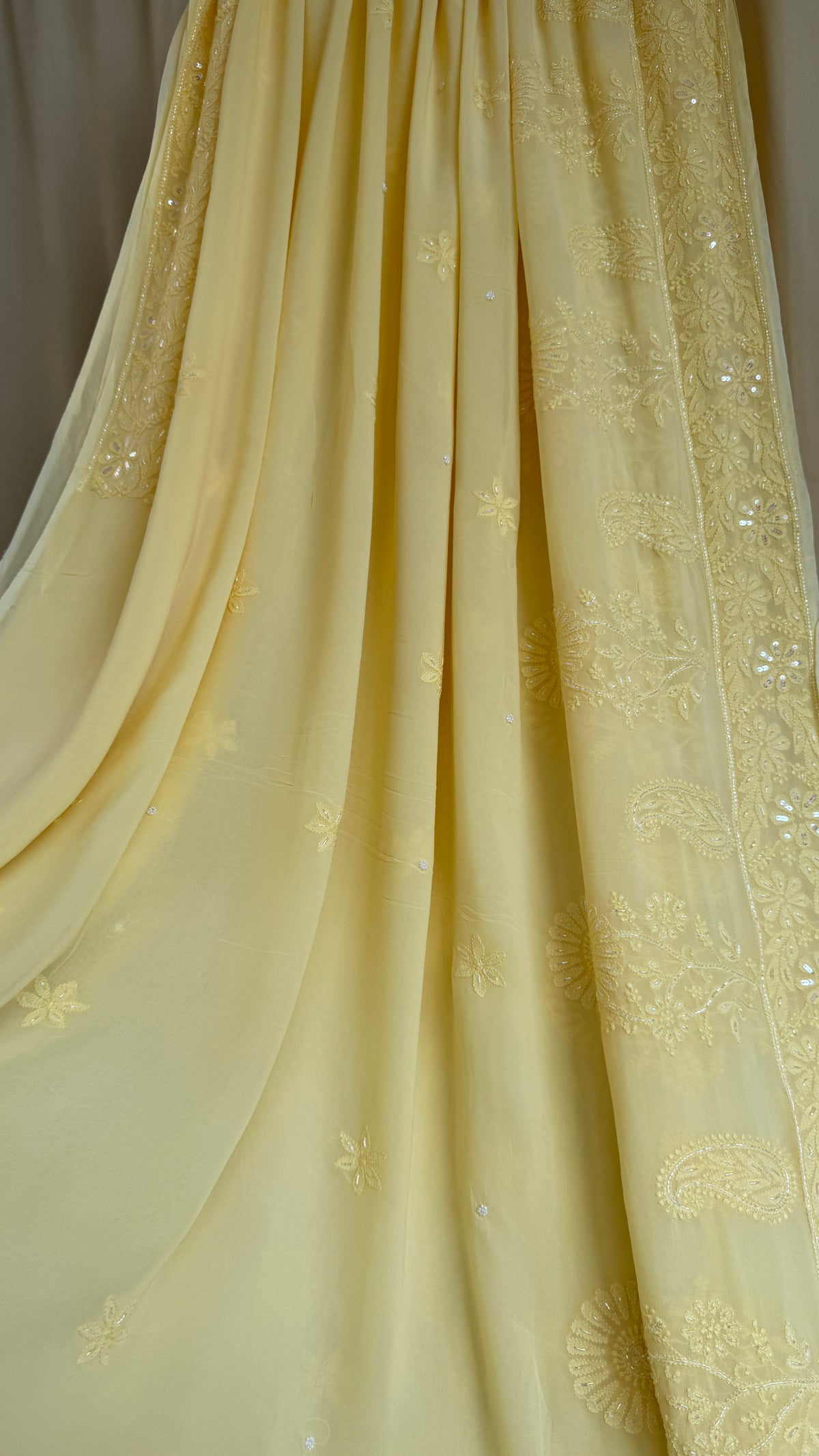 Cream Yellow Chikankari saree with Pearl embellishments