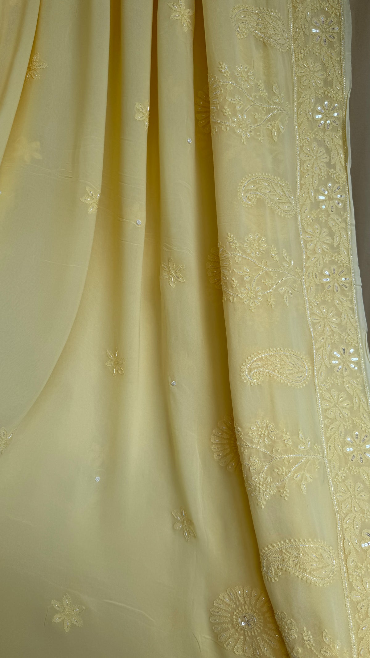 Cream Yellow Chikankari saree with Pearl embellishments