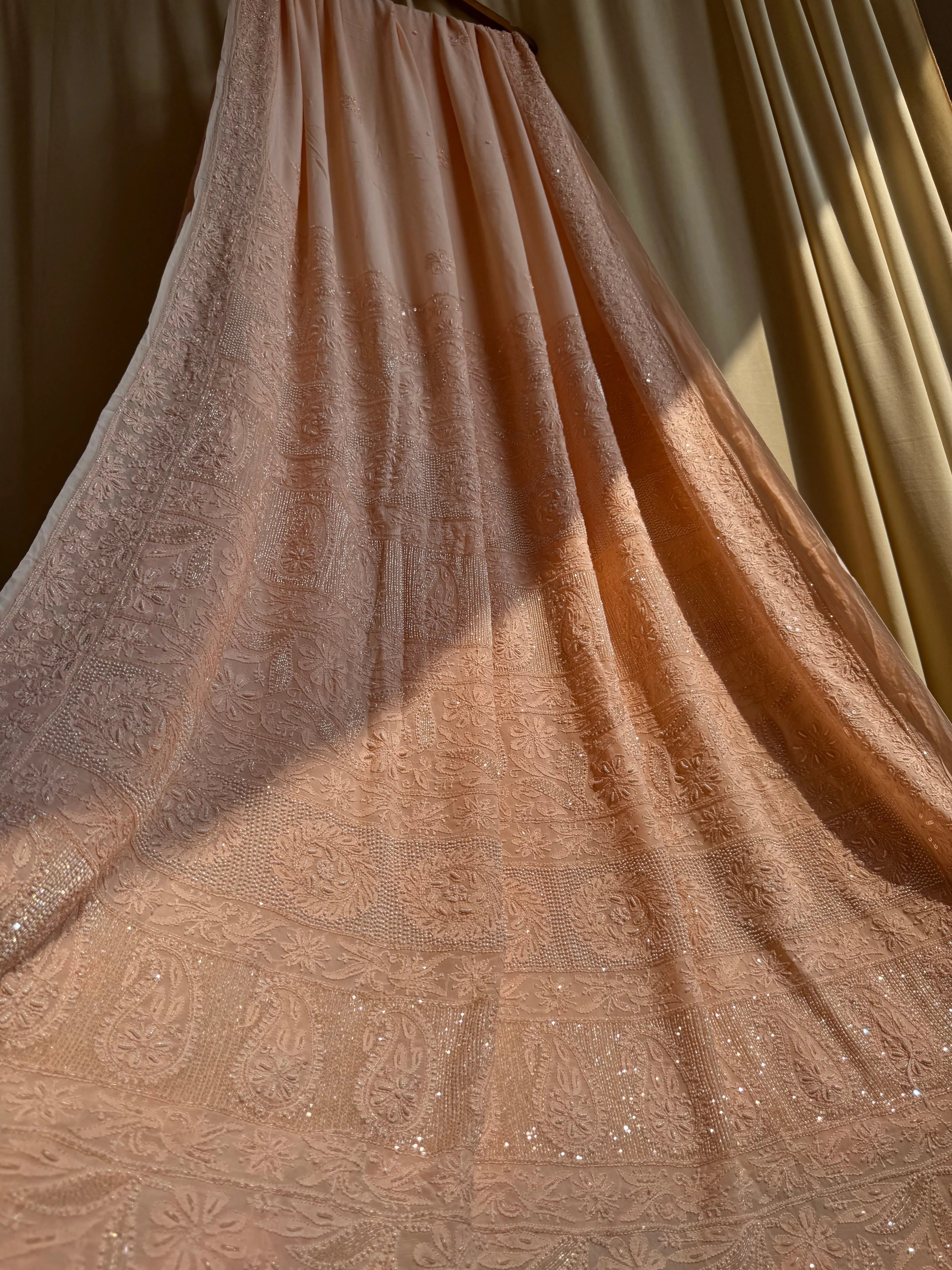 Viscose Peach Chikankari saree with Pearl embellishments ARIAA CHIKANKARI 