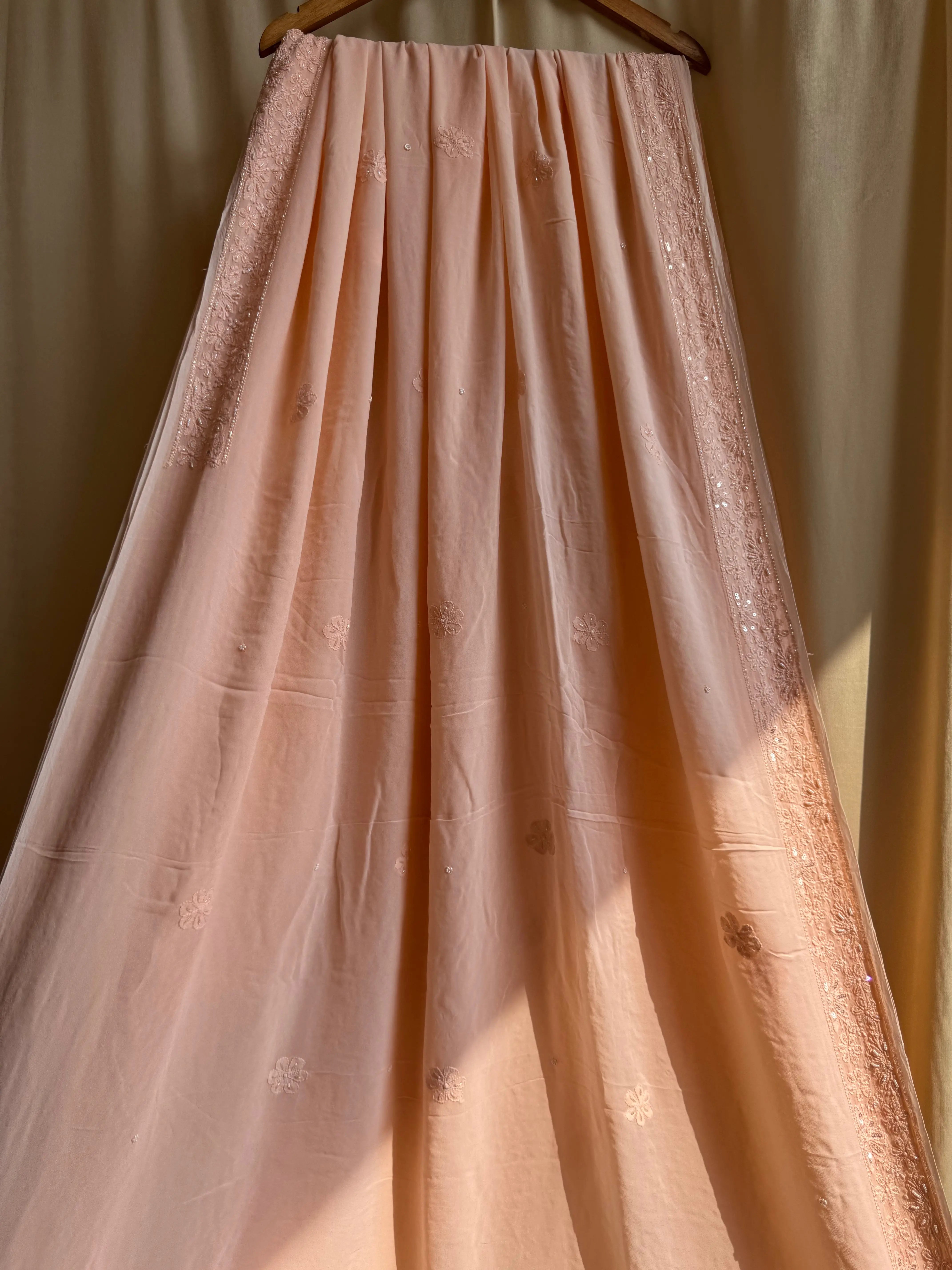 Viscose Peach Chikankari saree with Pearl embellishments ARIAA CHIKANKARI 