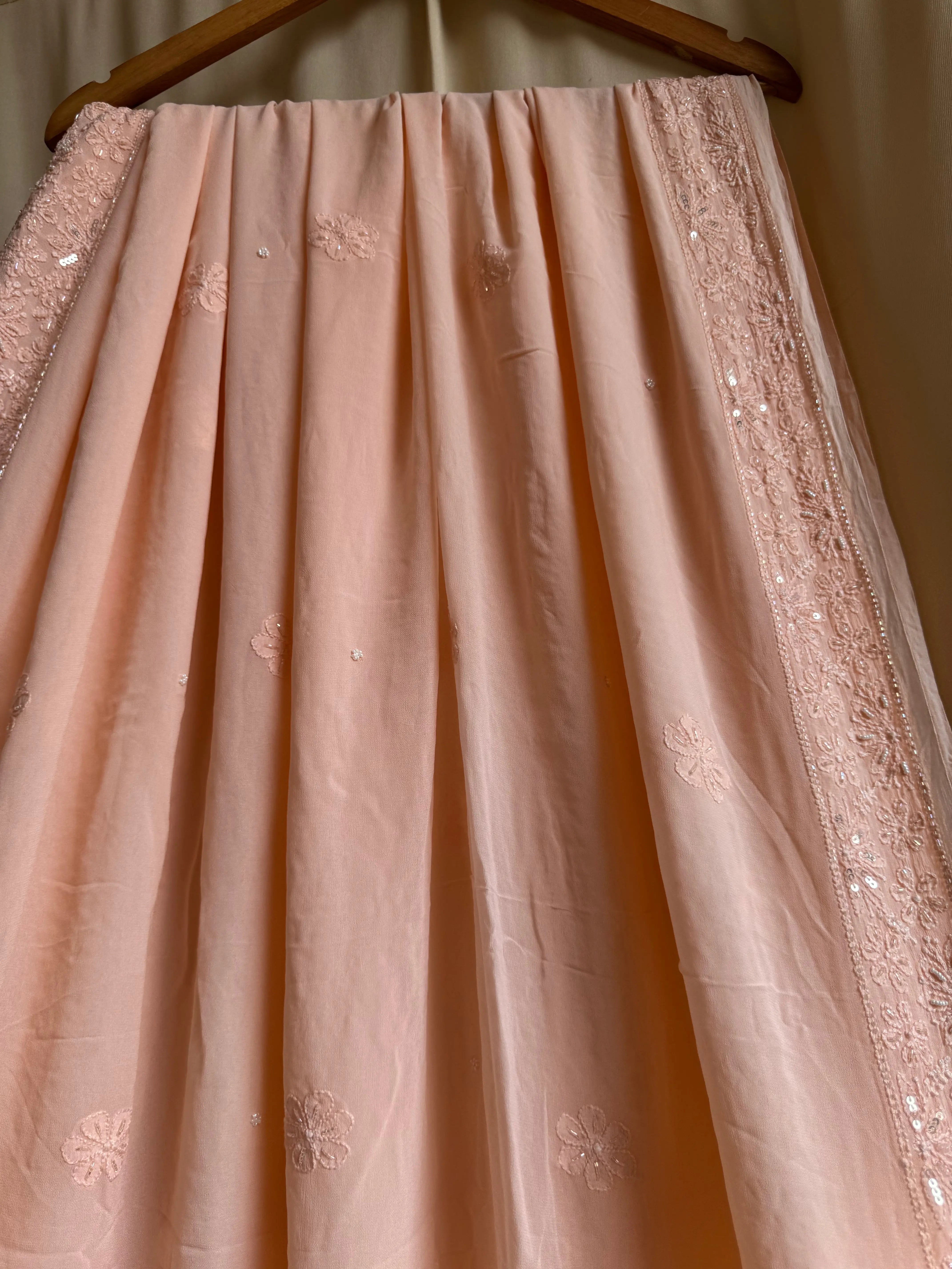 Viscose Peach Chikankari saree with Pearl embellishments ARIAA CHIKANKARI 
